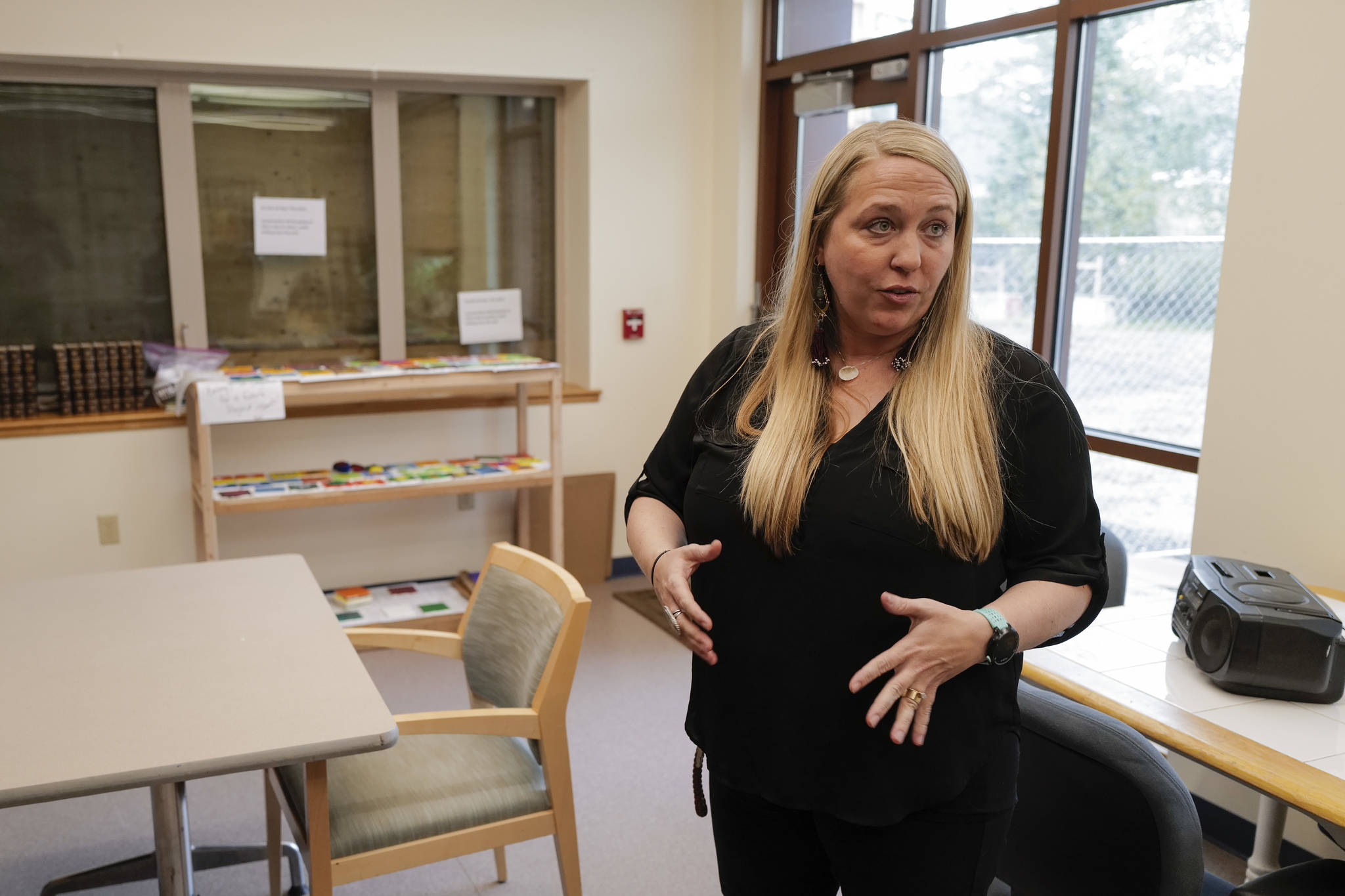 Dacia Davis, program manager for Juneau Housing First Collaborative’s Forget-Me-Not Manor, gives a tour of the facility on Wednesday, Sept. 11, 2019. It is the two-year anniversary of the project that provides housing and support services to chronically homeless adults who have struggled with alcohol and are high utilizers of emergency services within the City and Borough of Juneau. Phase II to build another 32 apartments is currently underway and will open late next year. (Michael Penn | Juneau Empire)