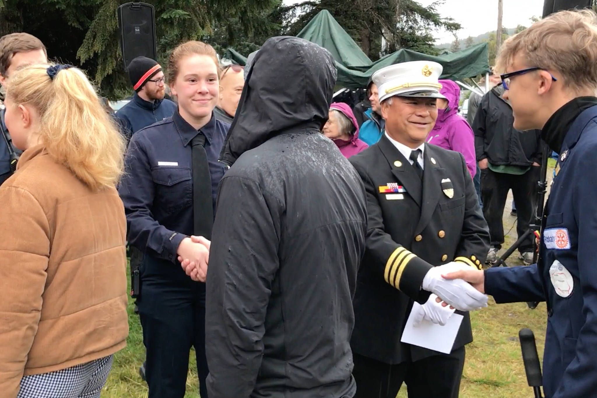Juneau residents greet first responders during a 9/11 Memorial at Rotary Park on Sept. 11, 2019. (Michael Penn | Juneau Empire)