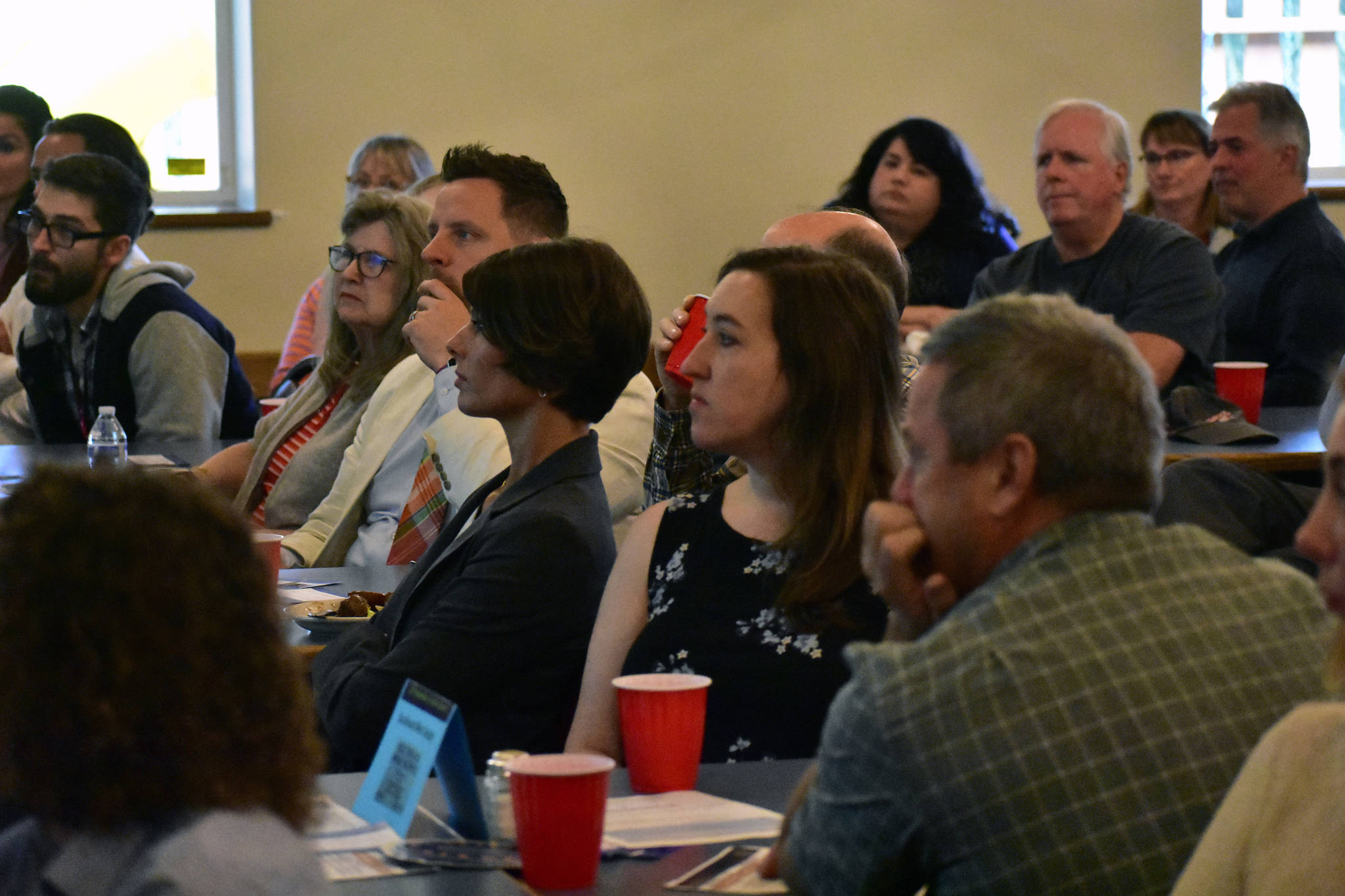 The audience at the Moose Lodge listens to Frank Reid speak at the Juneau Chamber of Commerce luncheon on Thursday, Sept. 12, 2019. (Peter Segall | Juneau Empire)