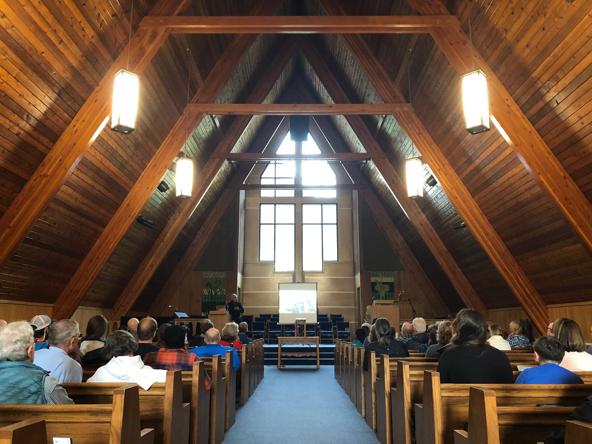 Rev. Charles Brower speaks at Northern Light United Church in Juneau during the “Climate Change Through the Eyes of Alaska Natives,” forum on Sept. 12, 2019. (Peter Segall | Juneau Empire)