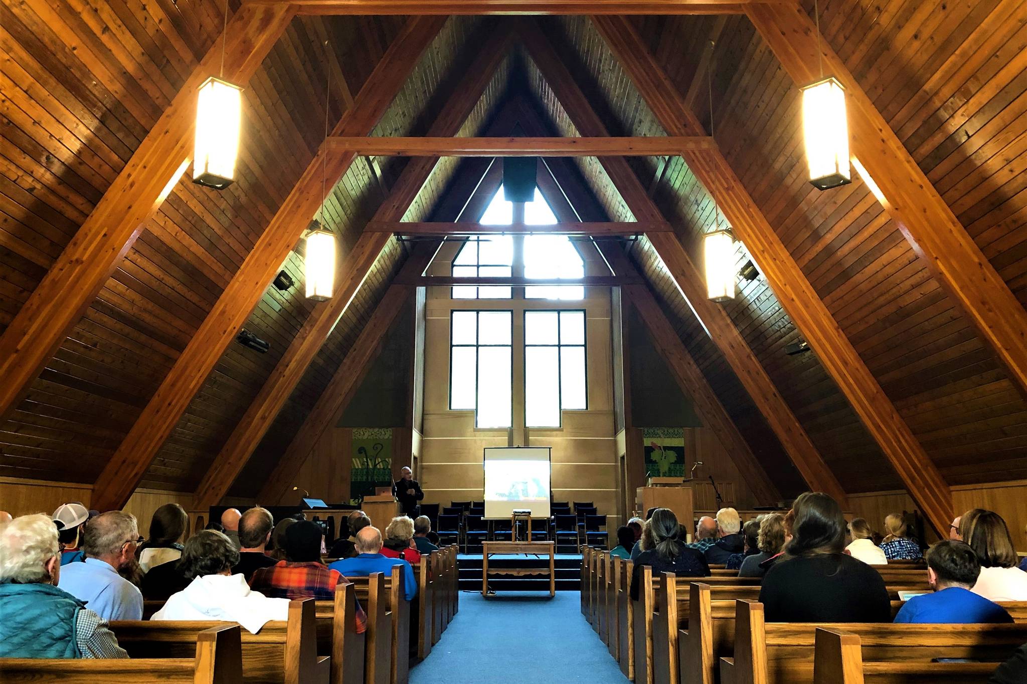 Rev. Charles Bower speaks at Northern Light United Church in Juneau during the “Climate Change Through the Eyes of Alaska Natives,” forum on Sept. 12, 2019. (Peter Segall | Juneau Empire)