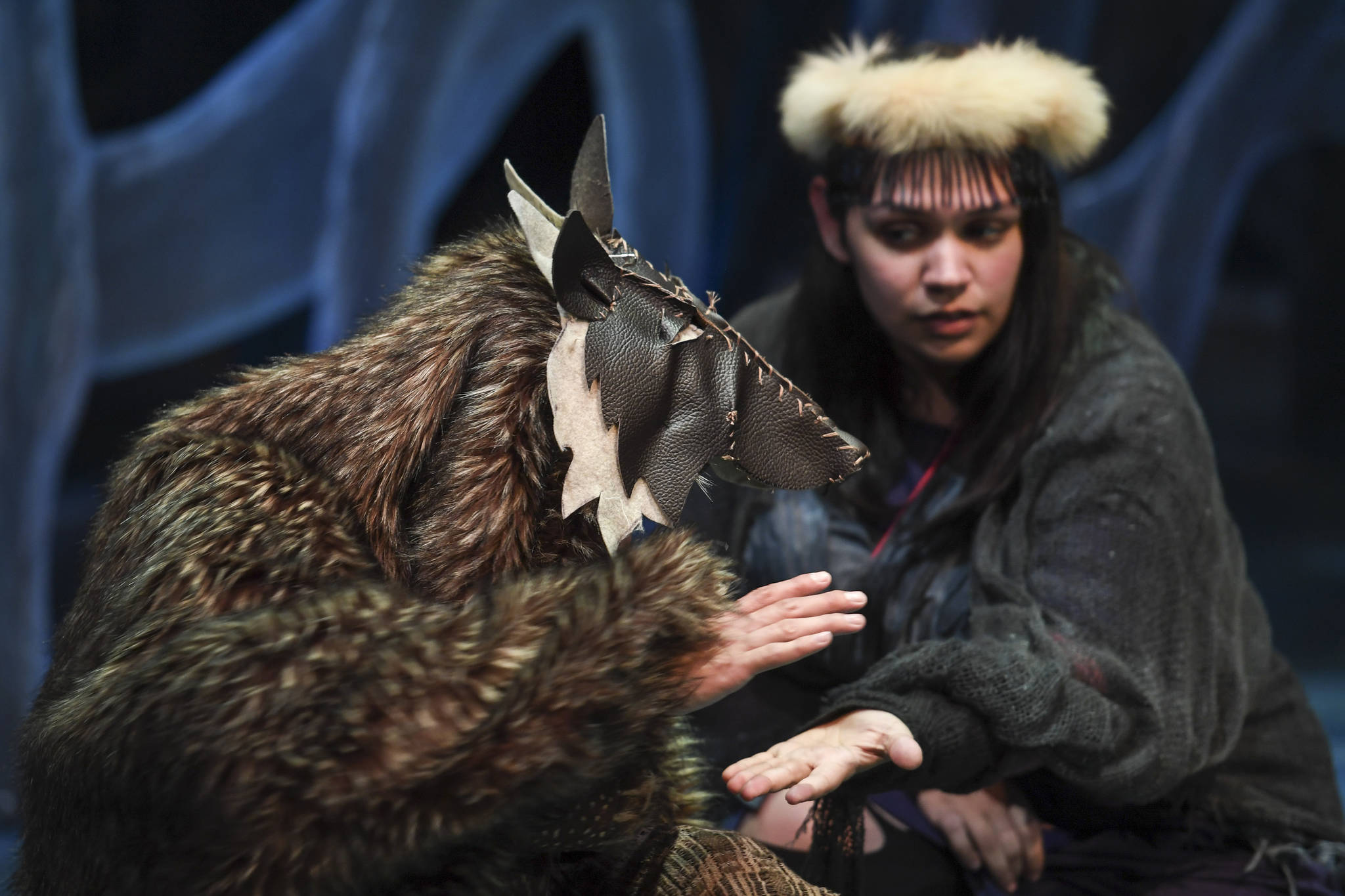 Erin Tripp, right, playing Aanteinatu, rehearses with Rio Alberto, playing a magical wolf, in Perseverance Theatre’s production of “Devilfish” written by Vera Starbard on Tuesday, Sept. 17, 2019. (Michael Penn | Juneau Empire)