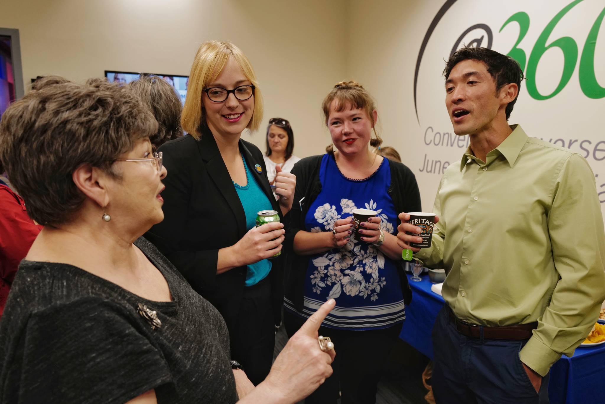 Former Assembly member Karen Crane, left, talks with Assembly candidates Carole Triem, Alicia Hughes-Skandijs and Greg Smith, right, before an Assembly and school board candidates forum at KTOO on Tuesday, Sept. 17, 2019. The event is sponsored by the Juneau League of Women Voters. (Michael Penn | Juneau Empire)
