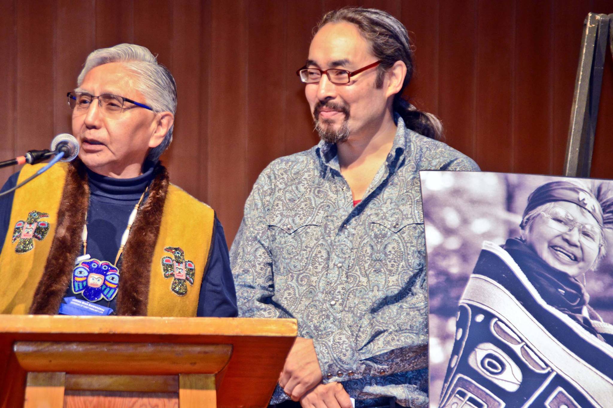 Paul Marks and Ishmael Hope speak during a banquet tribute to the late Nora Marks Dauenhauer, who is seen in the photo to Hope’s right. in this 2017 photo. (Courtesy Photo | Peter Metcalfe)