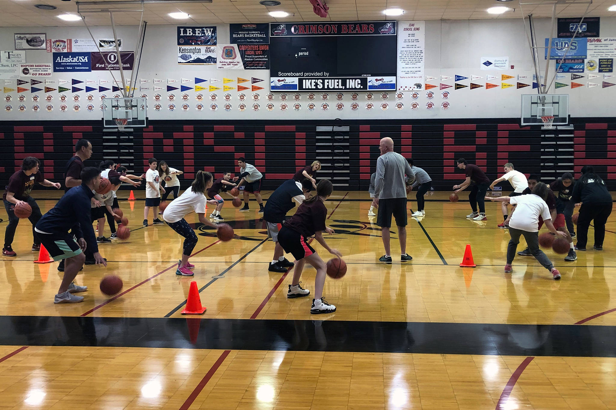 Campers and coaches practice dribbling at the I Did, You Can! basketball camp at Juneau-Douglas High School: Yadaat.at Kale on Sunday, Sept. 29, 2019. (Courtesy Photo | Janette Gagnon)
