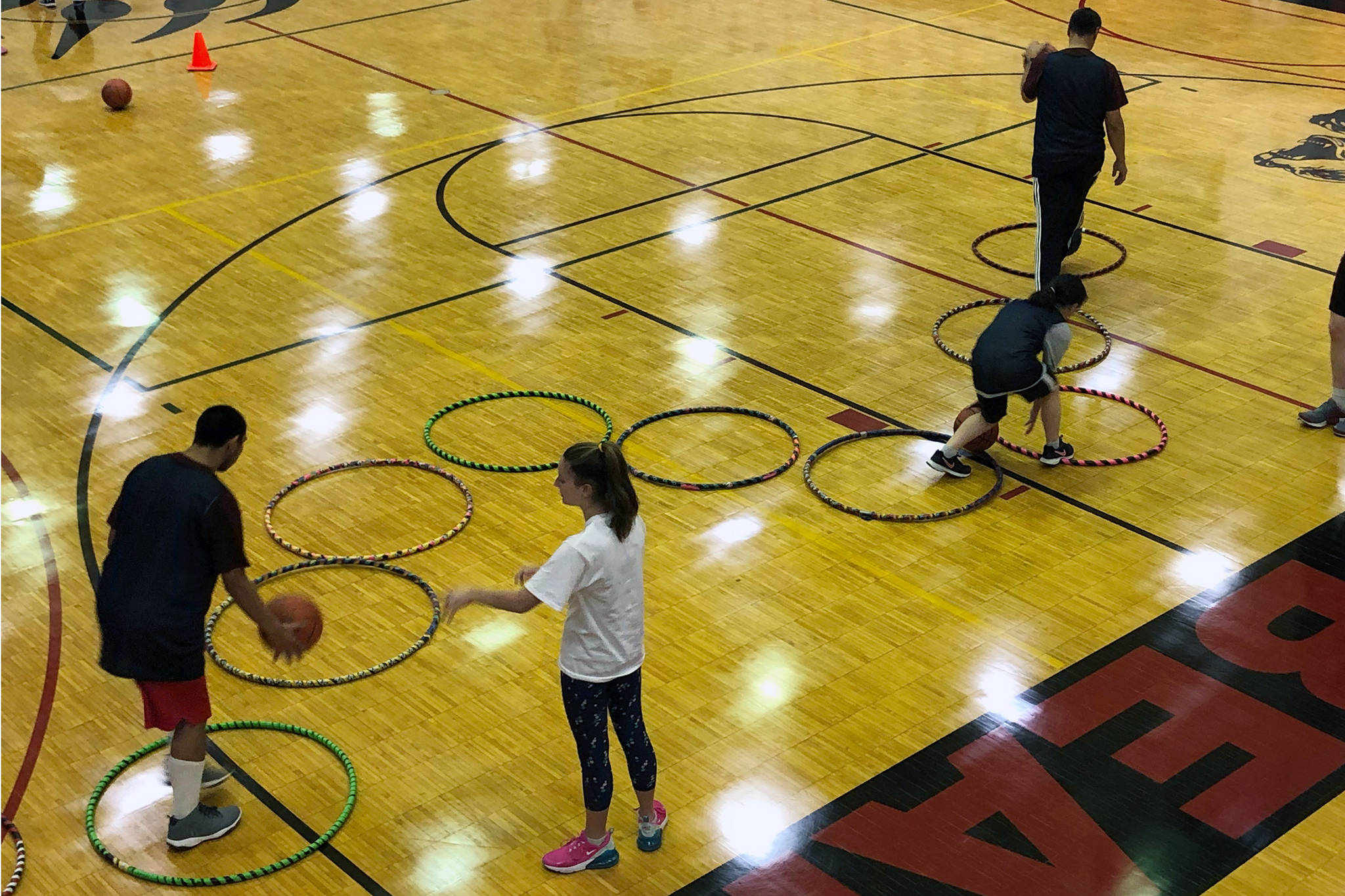 Campers dribble through hula hoops at the I Did, You Can! basketball camp at Juneau-Douglas High School: Yadaat.at Kale on Sunday, Sept. 29, 2019. (Courtesy Photo | Janette Gagnon)