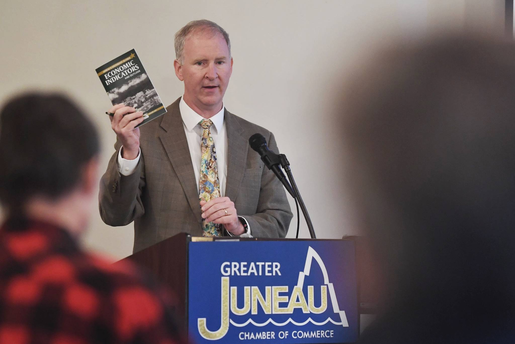 Brian Holst, executive director of the Juneau Economic Development Council, speaks about the council’s economic indicator report to the Juneau Chamber of Commerce during its weekly luncheon at the Moose Lodge on Thursday, Oct. 3, 2019. (Michael Penn | Juneau Empire)