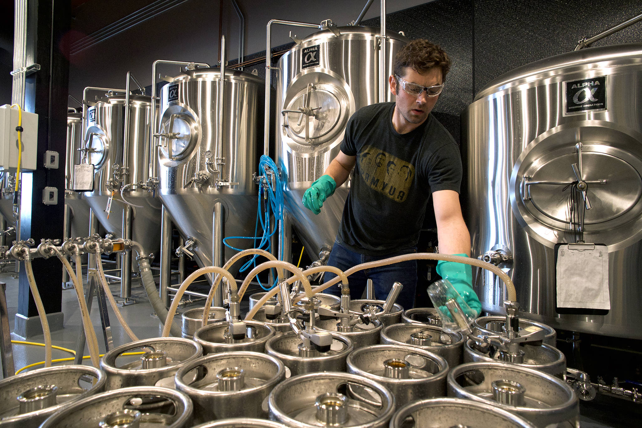 Brewer Erick Heimbigner fills kegs at the Forbidden Peak Brewery on Thursday, Oct. 3, 2019. The Auke Bay brewery is to open Saturday, Oct. 12. (Michael Penn | Juneau Empire)