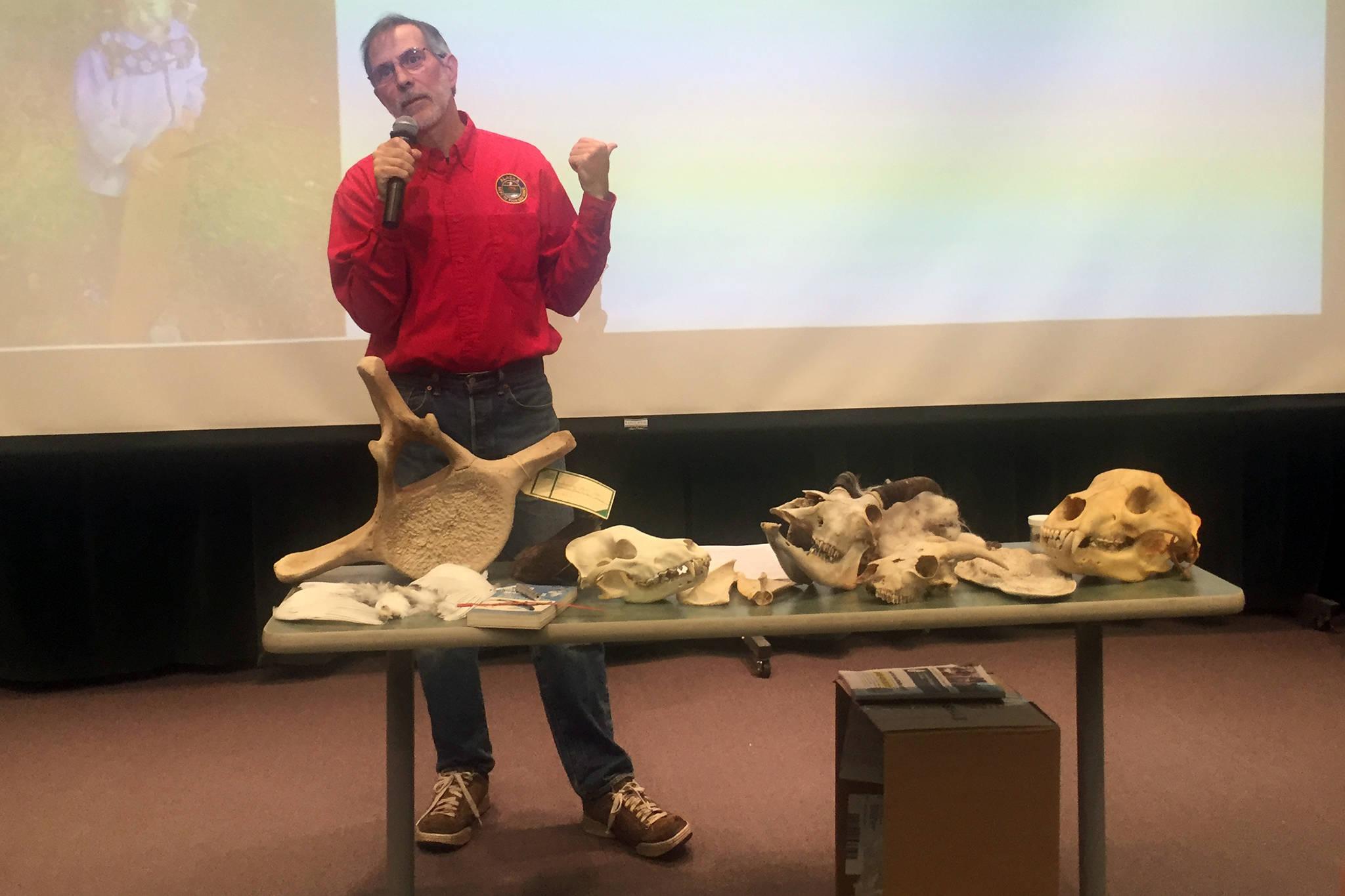 Riley Woodford, Alaska Department of Fish and Game Information Officer, talks at the Wildlife Wednesday presented by the Alaska Wildlife Alliance Southeast Chapter at the University of Alaska Southeast Egan Lecture Hall on Wednesday, Oct. 3, 2019. (Nolin Ainsworth | Juneau Empire)