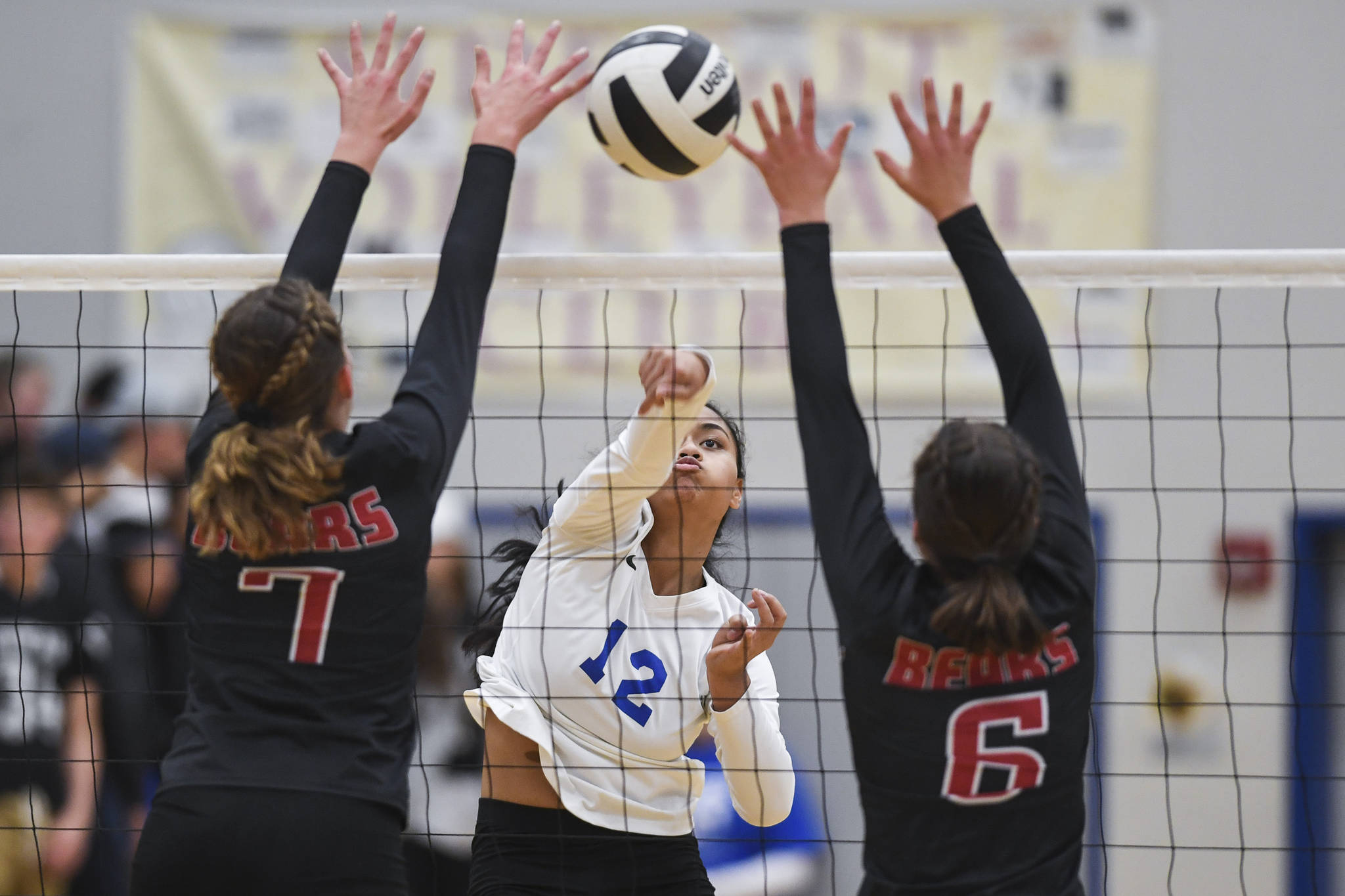 Photos: See the Falcons fly high in crosstown volleyball match