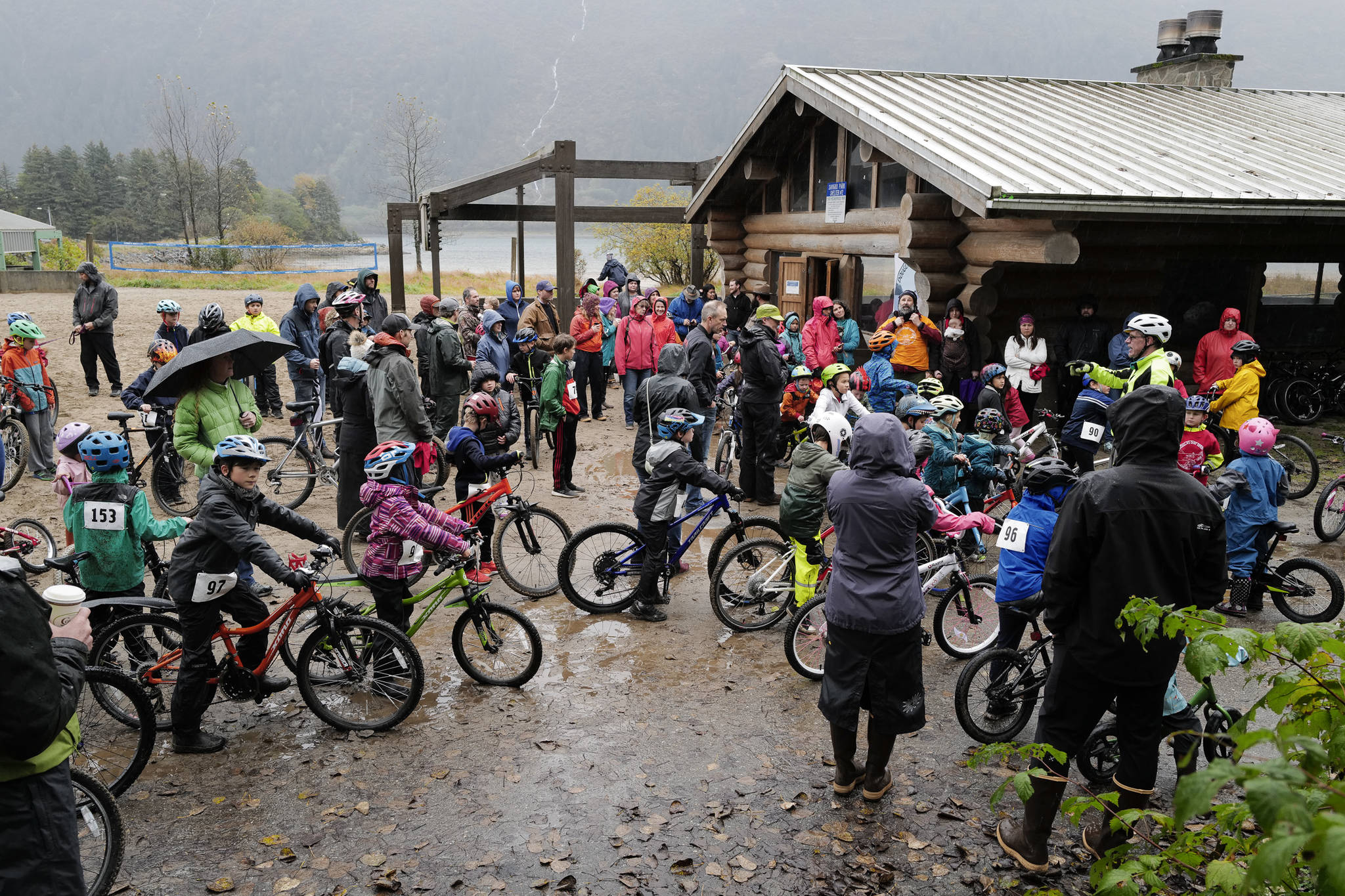 Dave Ringle gives directions before the Douglas Dirt Derby Youth Bike Race at Savikko Park and the Treadwell Historic Trail on Saturday, Oct. 5, 2019. The event was organized by the Juneau Freewheelers Bicycle Club. (Michael Penn | Juneau Empire)