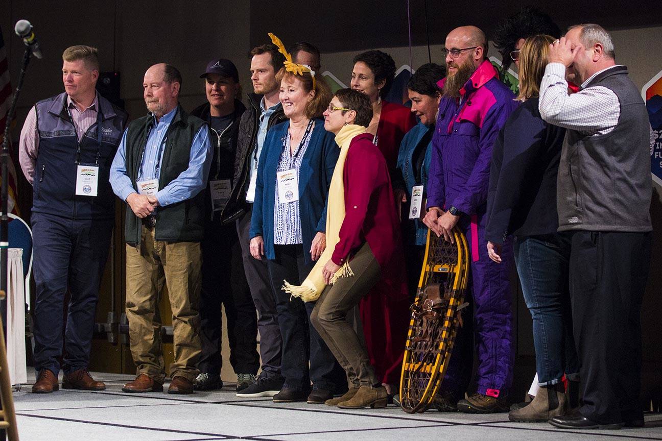 Judges and competitors pose for a photo after participating in the Alaska Tourism Industry Association’s version of “Shark Tank” during their annual conference, held this year at Centennial Center, Oct. 9, 2019. (Michael S. Lockett | Juneau Empire)