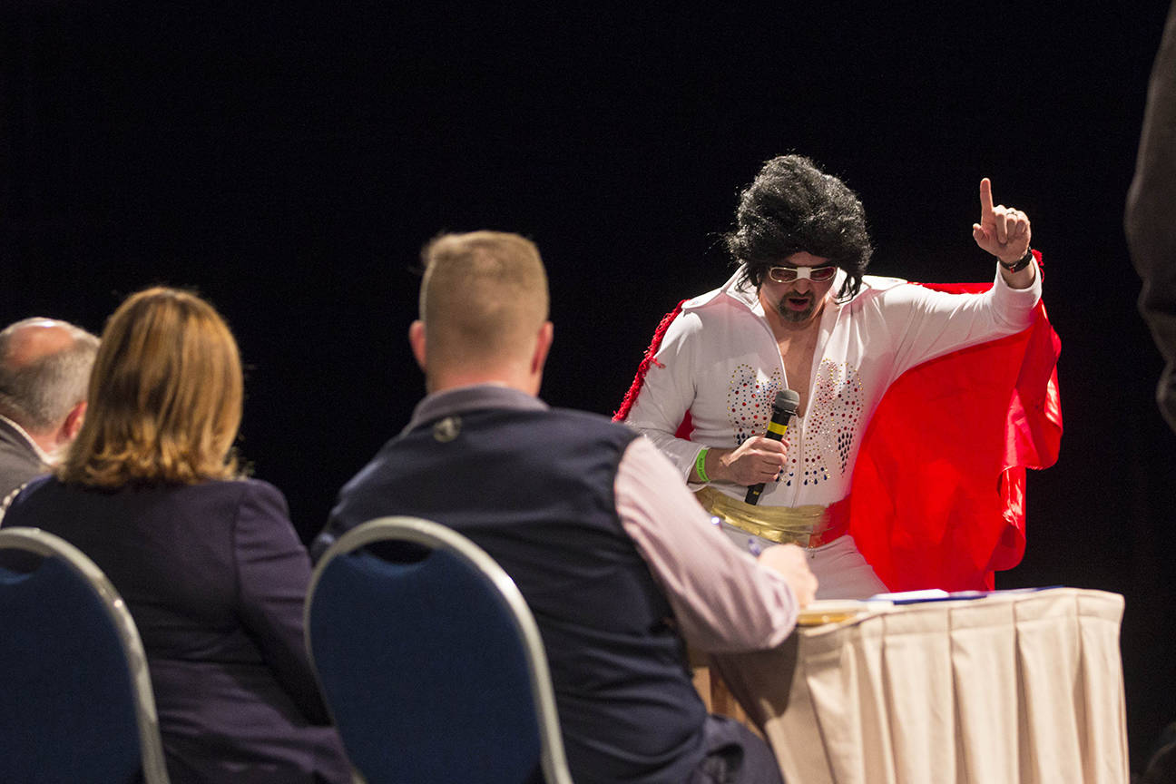 Eric Fullerton makes his investment pitch during the Alaska Tourism Industry Association’s version of “Shark Tank” during their annual conference, held this year at Centennial Center, Oct. 9, 2019. (Michael S. Lockett | Juneau Empire)