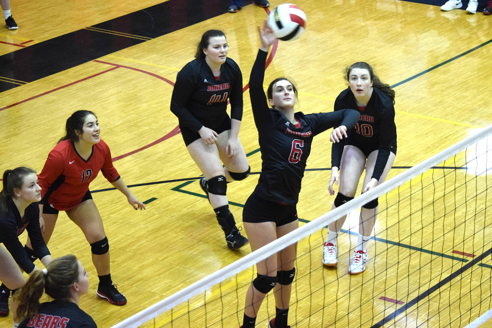 Juneau-Douglas: Yadaat.at Kalé’s Addie Prussing spikes the ball against Craig at the Juneau Invitational Volleyball Extravaganza at Juneau-Douglas High School: Yadaat.at Kalé on Friday, Oct. 11, 2019. (Nolin Ainsworth | Juneau Empire)