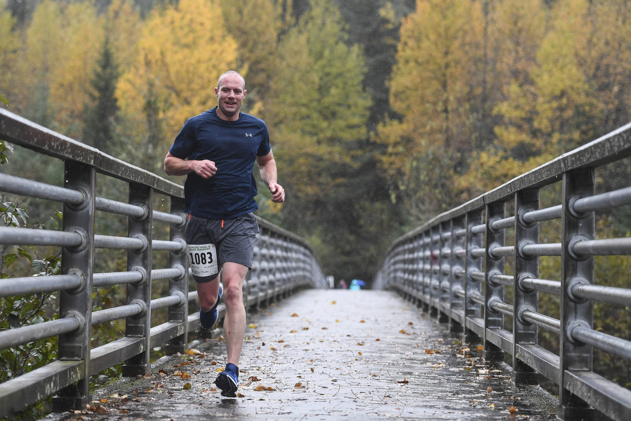 Brandon Ivanowicz takes the lead in the annual community mental health run, the Extra Tough 5K & 1 Mile Run, on Saturday, Oct. 12, 2019, at Riverbend Elementary School. The run is sponsored by National Alliance on Mental Illness (NAMI) Juneau. (Michael Penn | Juneau Empire)
