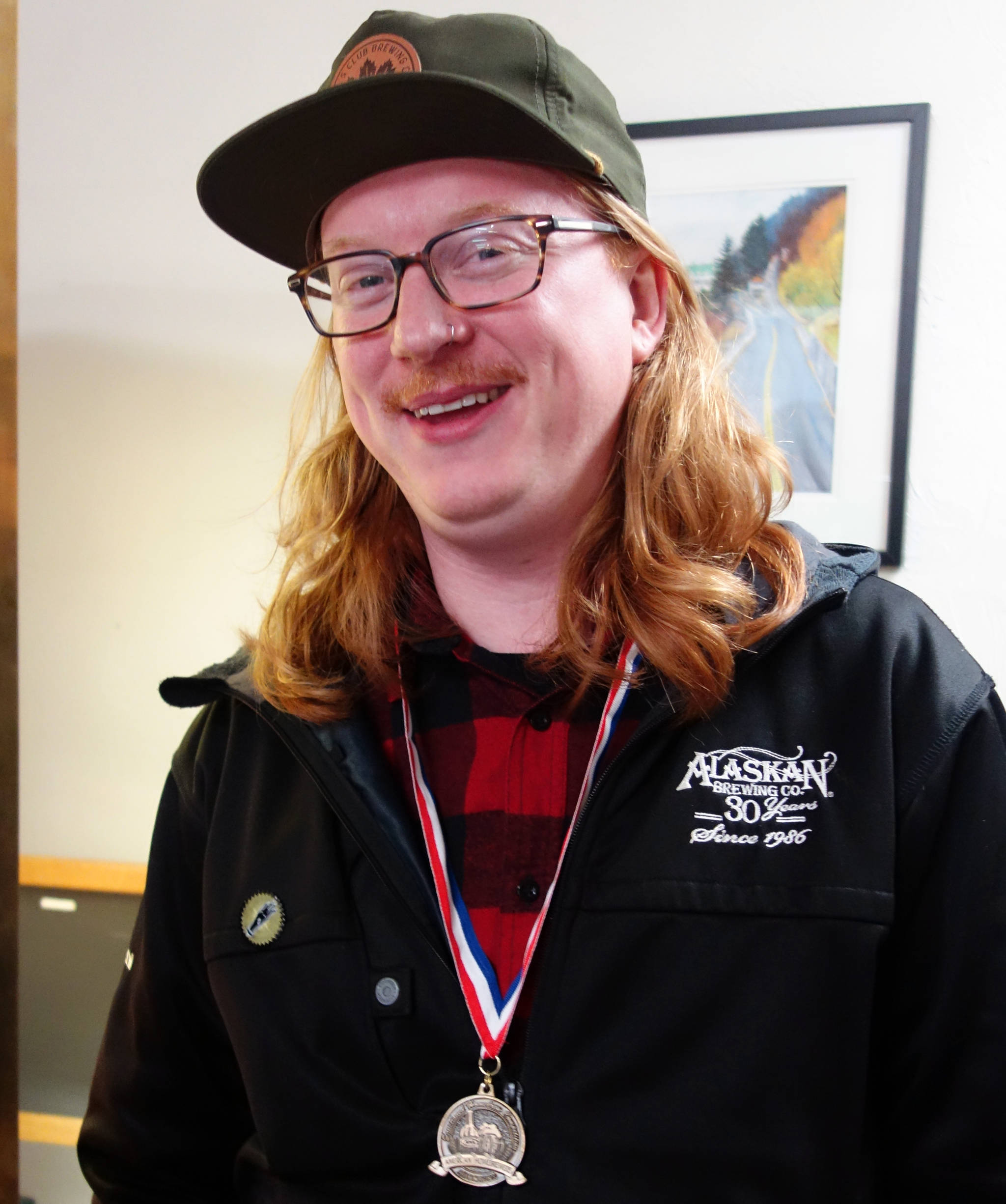 Kent Ficek, a Juneau homebrewer, smiles after tying for best in show in the Alaskan Homebrewing Competition, Oct. 12, 2019. The competition’s results were announced during AKtoberfest. (Ben Hohenstatt | Juneau Empire)