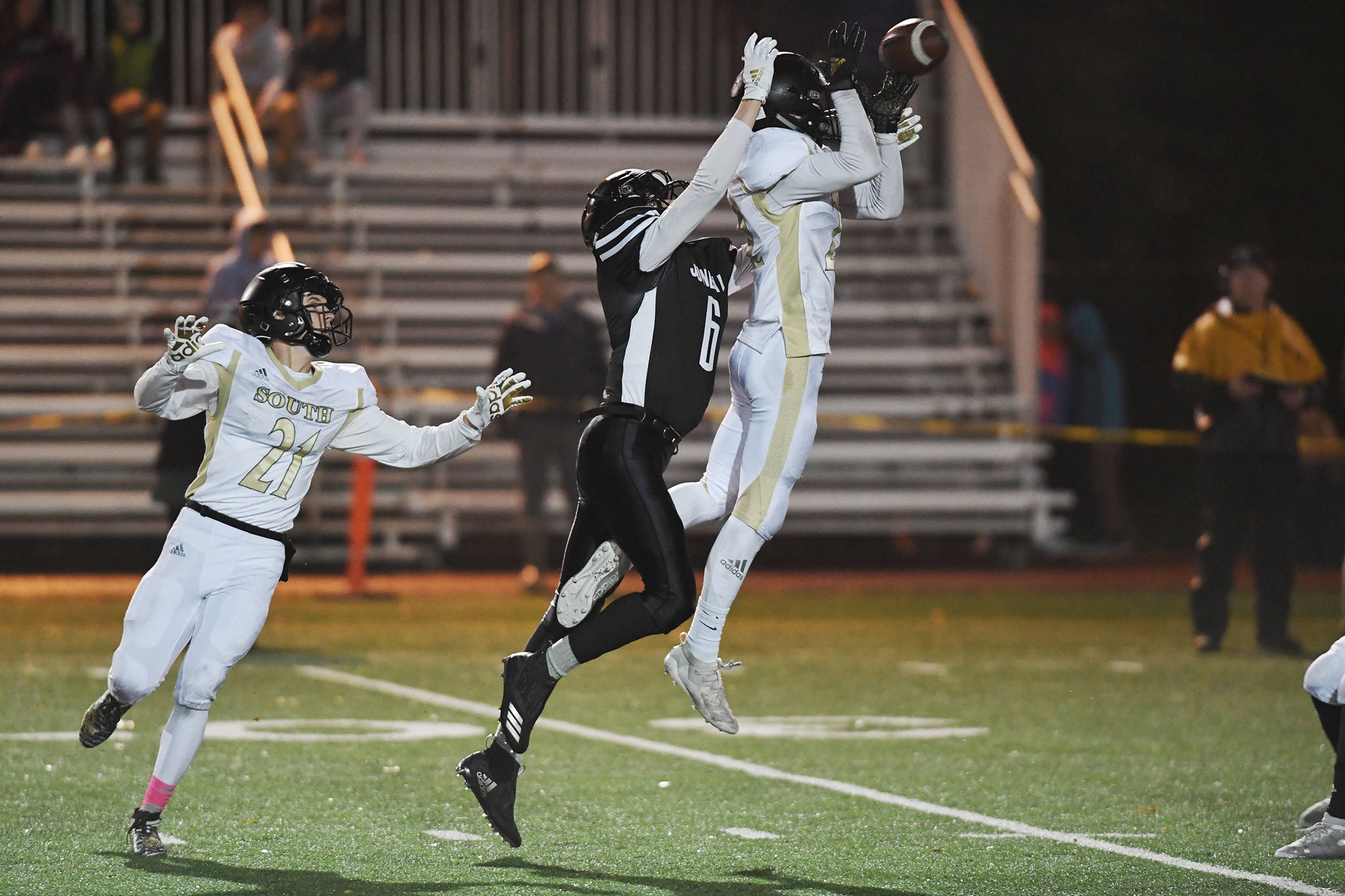 South Anchorages Aidan Ohlson intercepts a pass meant for Garrett Bryant at Adair-Kennedy Memorial Field on Saturday, Oct. 12, 2019. (Michael Penn | Juneau Empire)