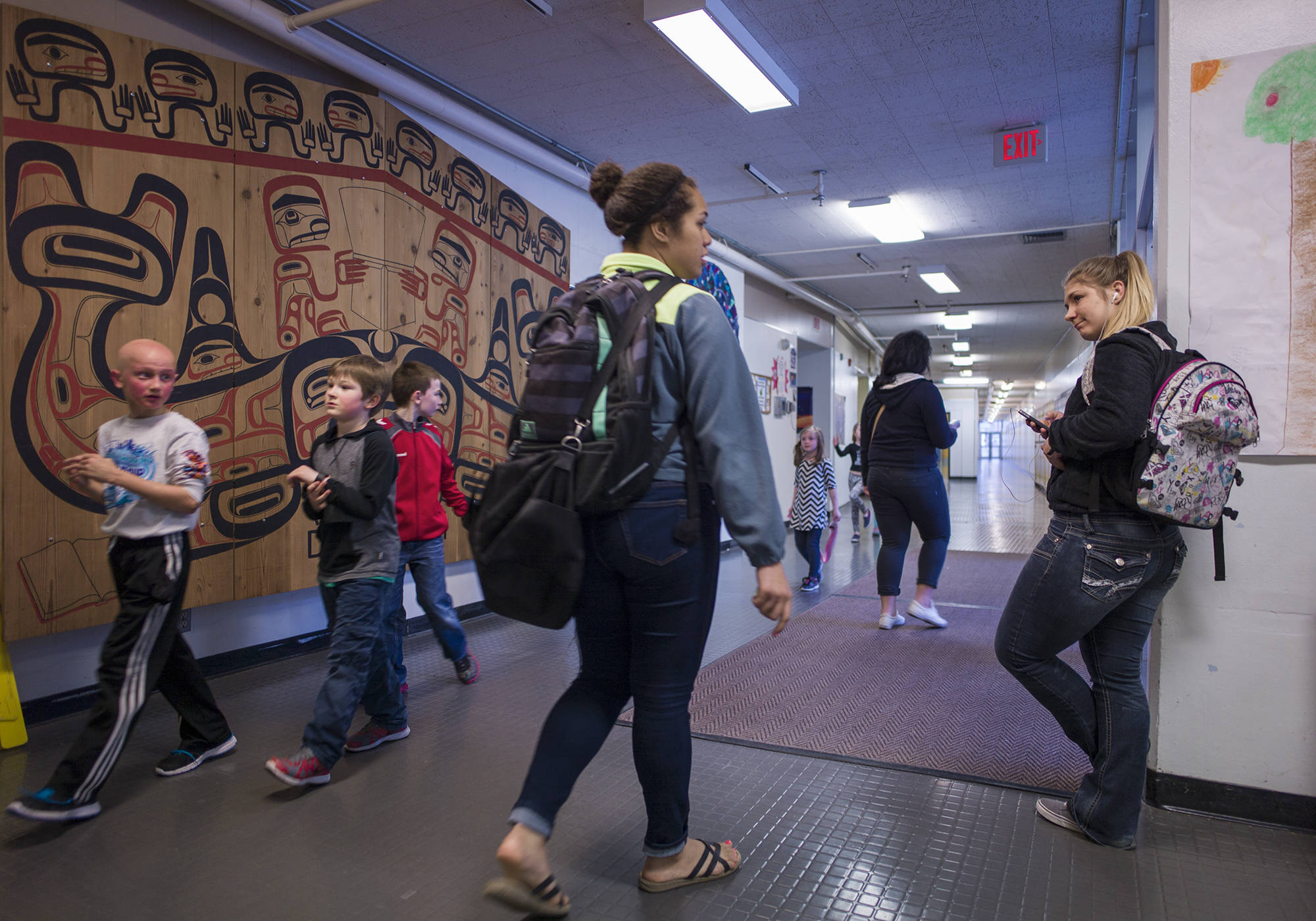 Students at Yaakoosgé Daakahídi Alternative High School prepare to leave the Marie Drake Building after school on May 25, 2015.