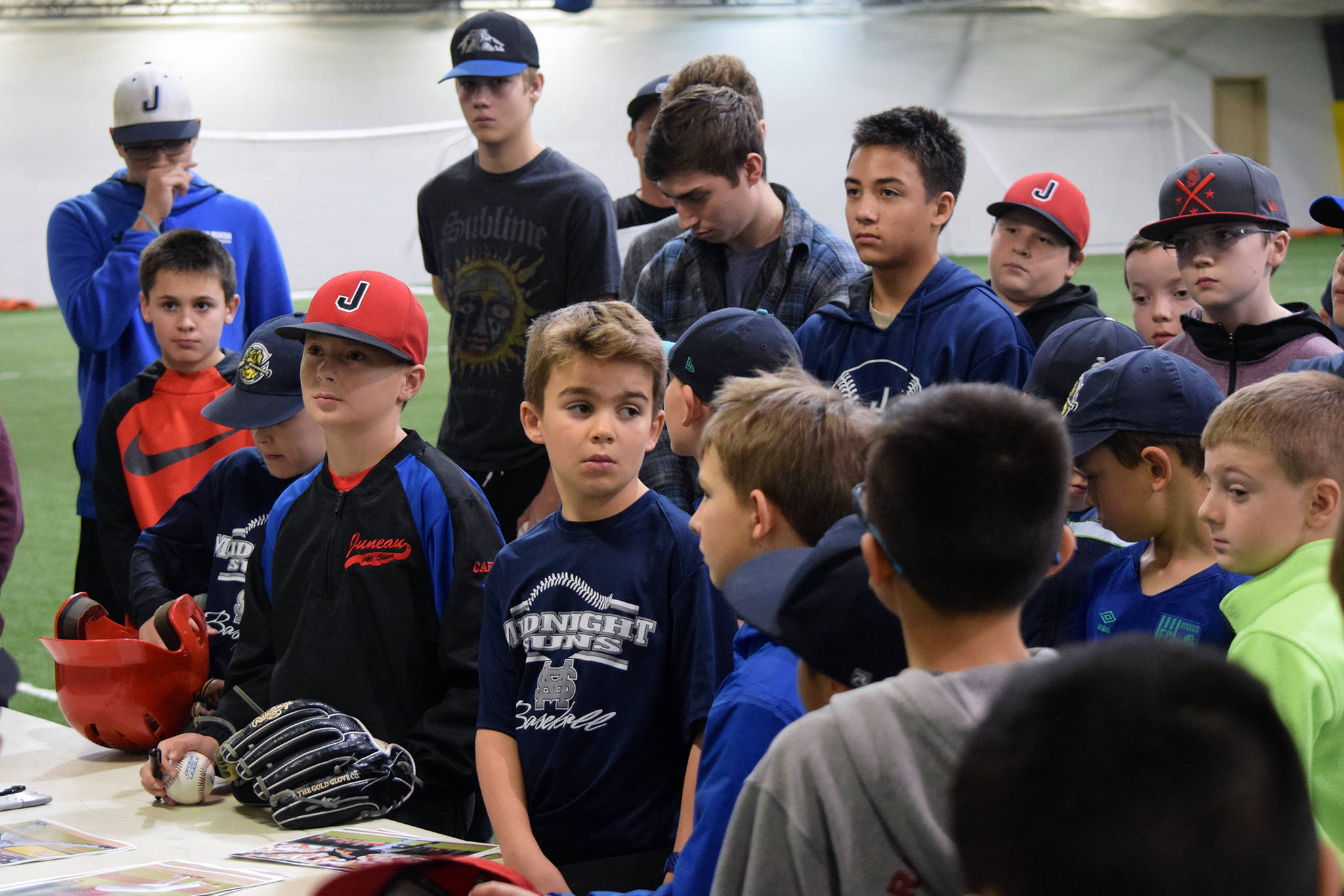 Midnight Suns Baseball Club baseball players listen to Cleveland Indians pitcher Zach Plesac at the Wells Fargo Dimond Park Field House on Thursday, Oct. 17, 2019. Approximately 70 players, parents and coaches gathered to hear Plesac’s story. (Nolin Ainsworth | Juneau Empire)