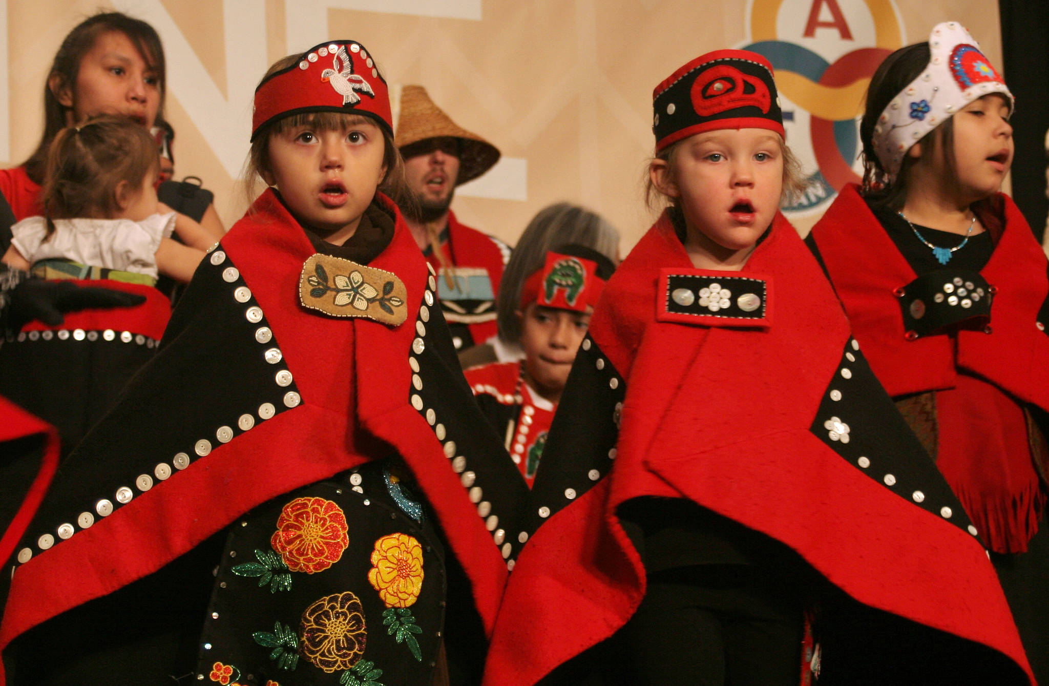 The Yees Ku Oo’, Woosh.ji.een and All Nation’s Children dance groups from Juneau perform on the closing day of the Alaska Federation of Natives Annual Convention in this October 2014 photo. (Michael Penn | Juneau Empire File)
