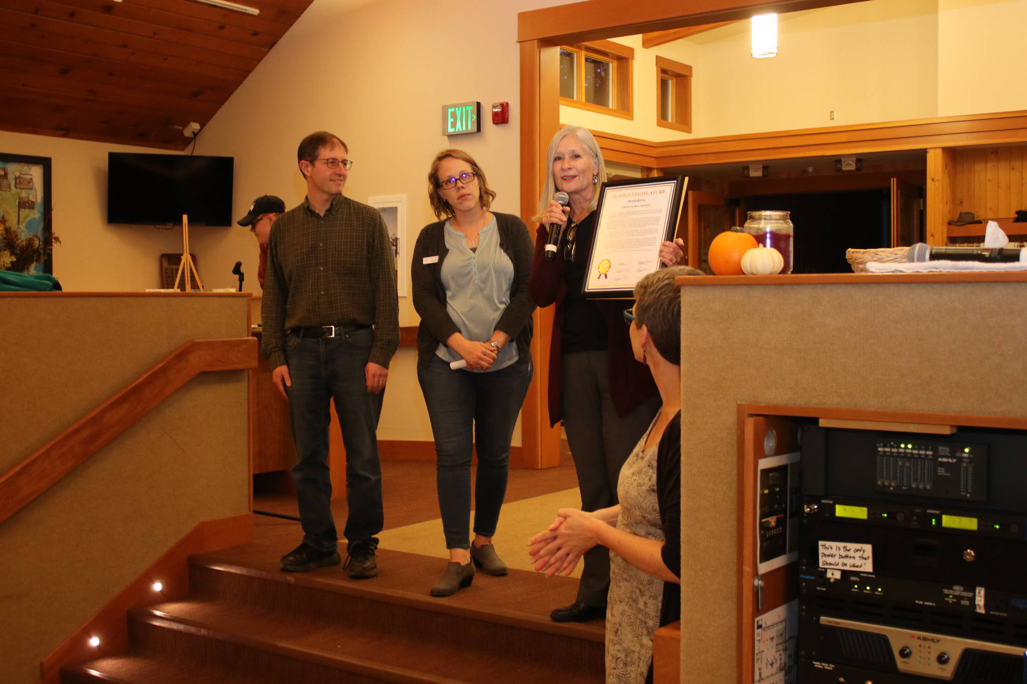 Rep. Andi Story, D-Juneau, left presents a Legislative Citation to Family Promise of Juneau at Chapel by the Lake on Sunday, Oct. 20, 2019. Standing with her are Family Promise of Juneau Executive Director Katherine Carlson and Sen. Jesse Kiehl, D-Juneau. (Courtesy photo | Family Promise of Juneau)