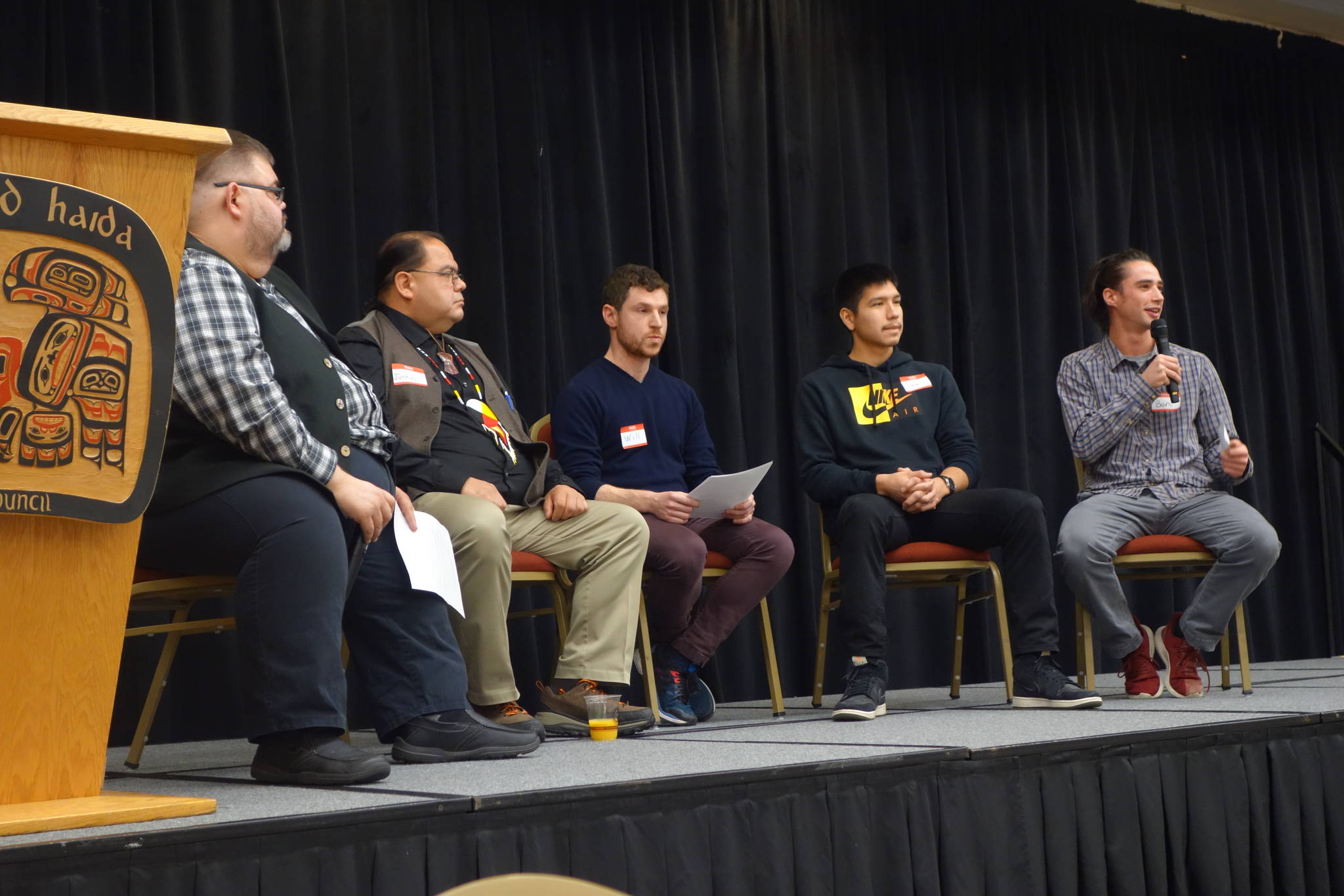 A panel of men discuss the role they can play in breaking cycles of domestic violence during a domestic violence awareness summit at Elizabeth Peratrovich Hall, Friday, Oct. 25, 2019. (Ben Hohenstatt | Juneau Empire)