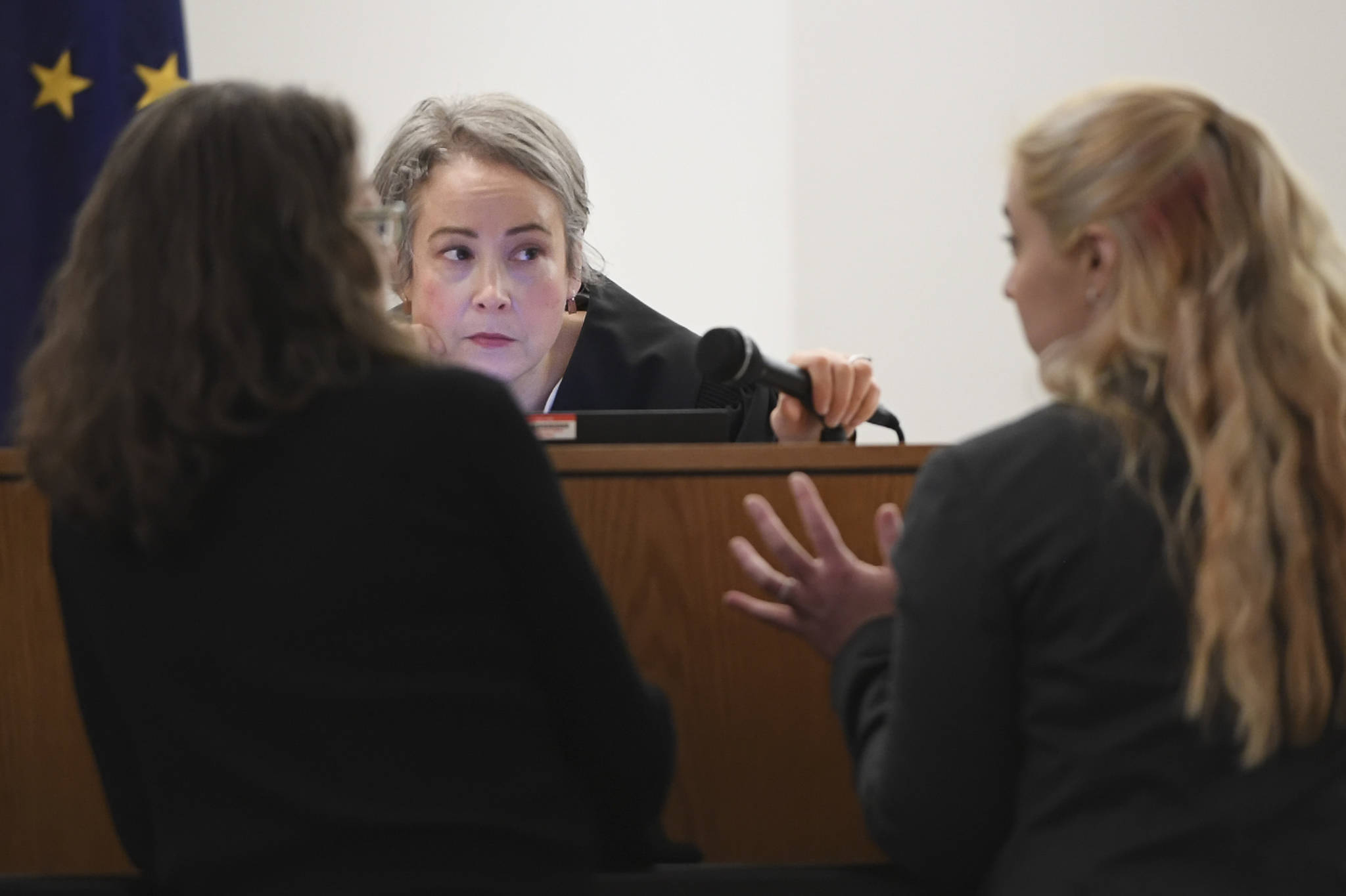 Juneau Superior Court Judge Amy Mead, center, listens to Assistant Attorney General Lisa Kelley, right, and Public Defender Agency’s Deborah Macaulay during the trial of Loretto Lee Jones in Juneau Superior Court on Thursday, Oct. 31, 2019. Jones is on trial for Alaska Permanent Fund Dividend felony theft and fraud. The two charges stem from allegations that Jones filed for her PFD payout in 2016 while having resided outside the state for more than 180 days. (Michael Penn | Juneau Empire)