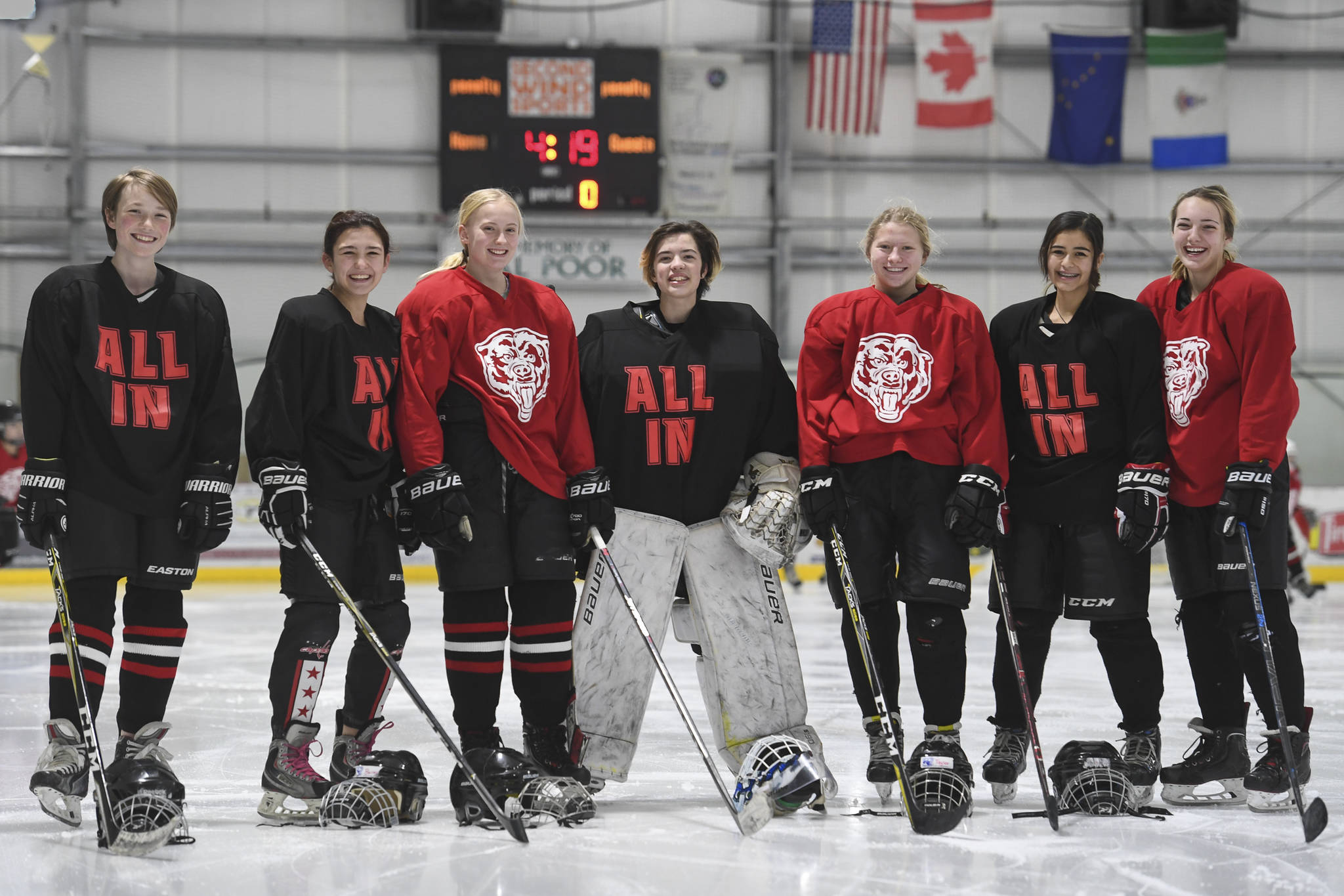 Seven girls are on the Juneau-Douglas High School: Yadaat.at Kalé hockey program this season and were photographed at Treadwell Arena on Thursday, Oct. 31, 2019. From left: Minta Schwartz, Bailey Hansen, Anna Dale, Lydia Ploof, Taylor Bentley, Nikki Lahnum and Kyla Bentz. (Michael Penn | Juneau Empire)
