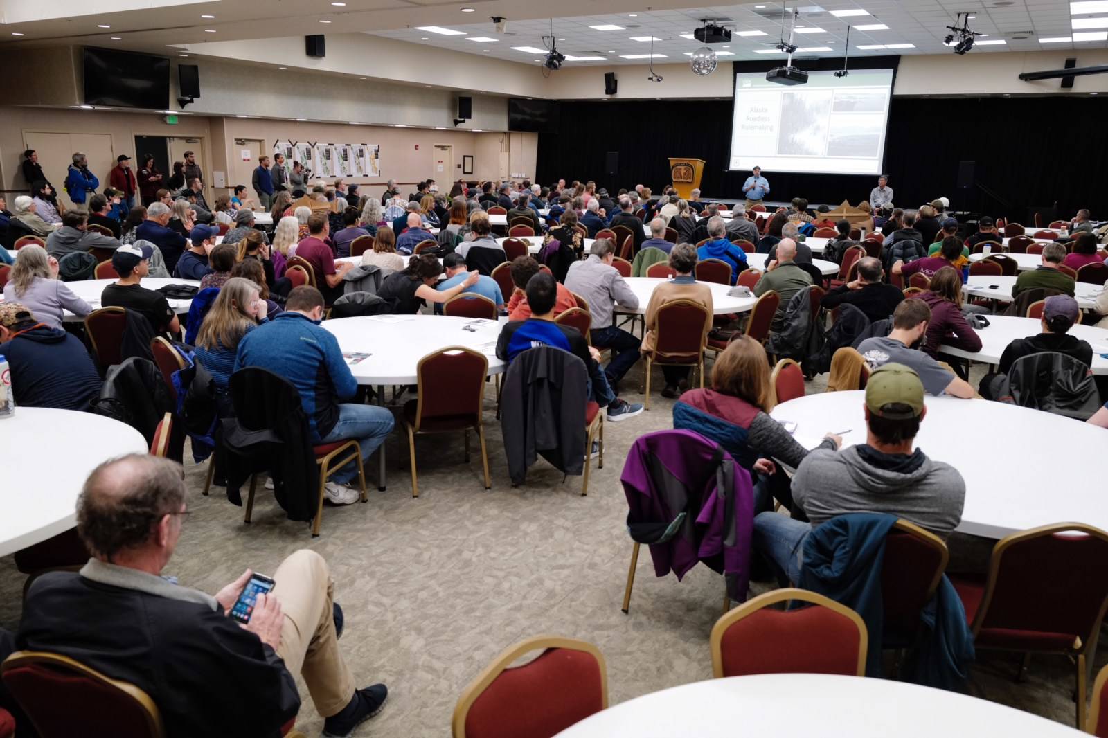 A full house listens during an informational meeting on the U. S. Forest Service’s <strong>Roadless Rule </strong>at the Elizabeth Peratrovich Hall on Monday, Nov. 4, 2019. (Michael Penn | Juneau Empire)