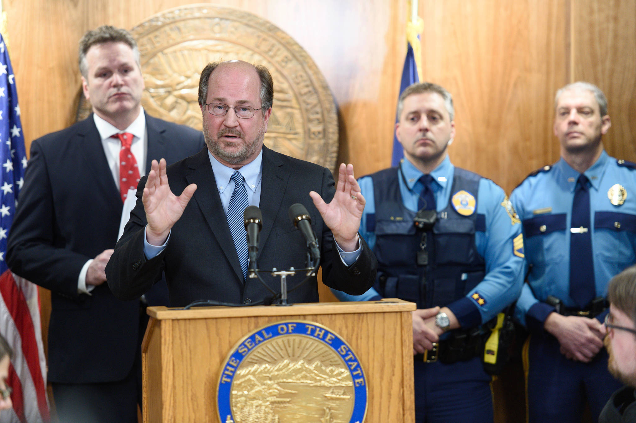 In this file photo, Alaska Attorney General Kevin Clarkson describes four new crimes bills at a press conference with Gov. Mike Dunleavy, left, and Alaska State Troopers at the Capitol on Wednesday, Jan. 23, 2019. (Michael Penn | Juneau Empire File)