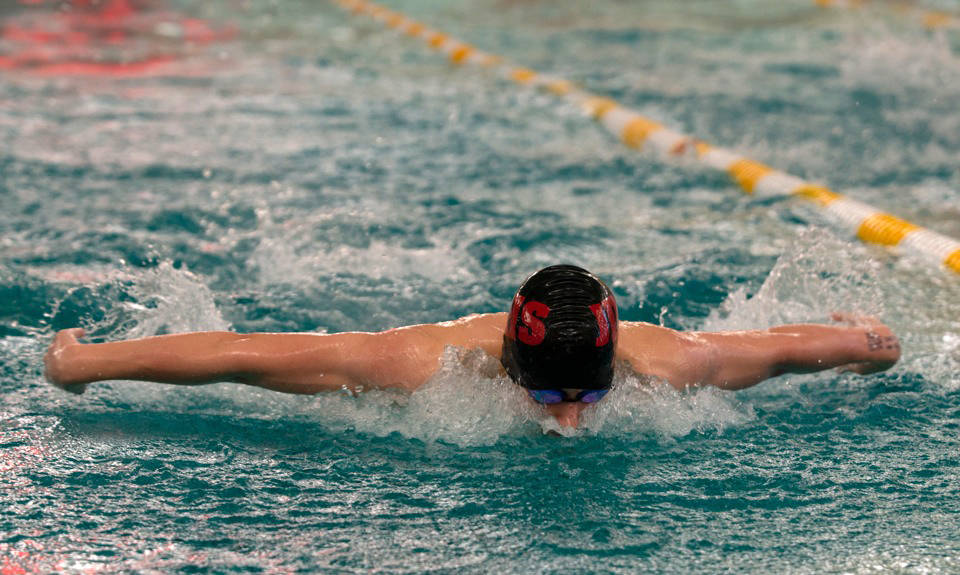 Juneau Douglas’ Chaz VanSlyke swims in the 100-yard butterfly final in the Region V Swimming and Diving Championships in Sitka on Saturday, Nov. 2, 2019. VanSlyke won the race with a time of 55.3 seconds. (James Poulson | Sitka Sentinel)