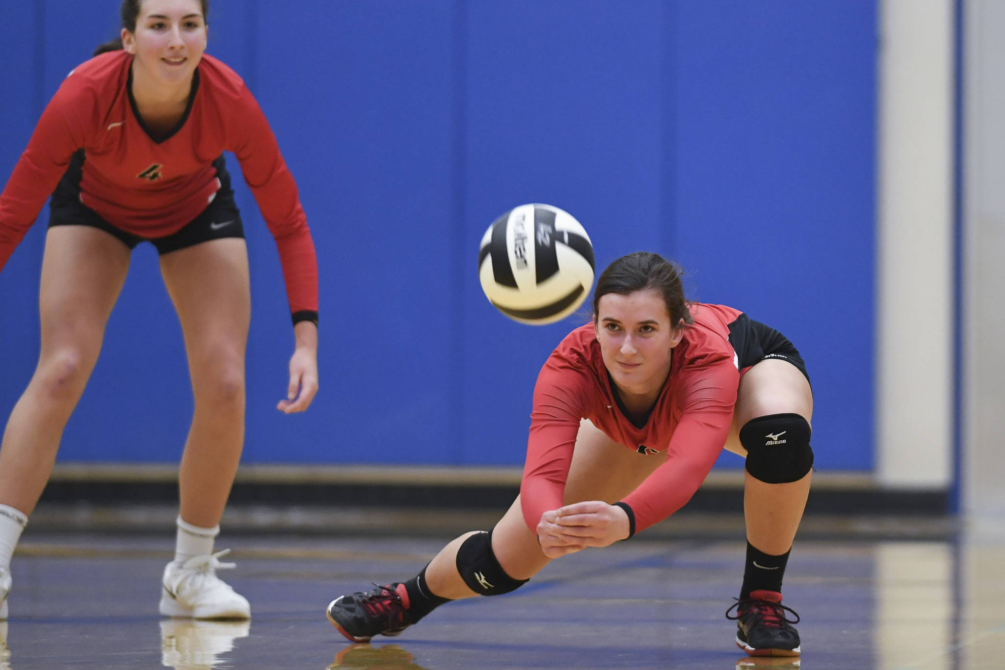 Juneau-Douglas’ Addie Prussing bumps the ball up against Ketchikan during the Region V Volleyball Tournament at Thunder Mountain High School on Thursday, Nov. 7, 2019. JDHS won 25-8, 25-14, 14-25, 25-15. (Michael Penn | Juneau Empire)