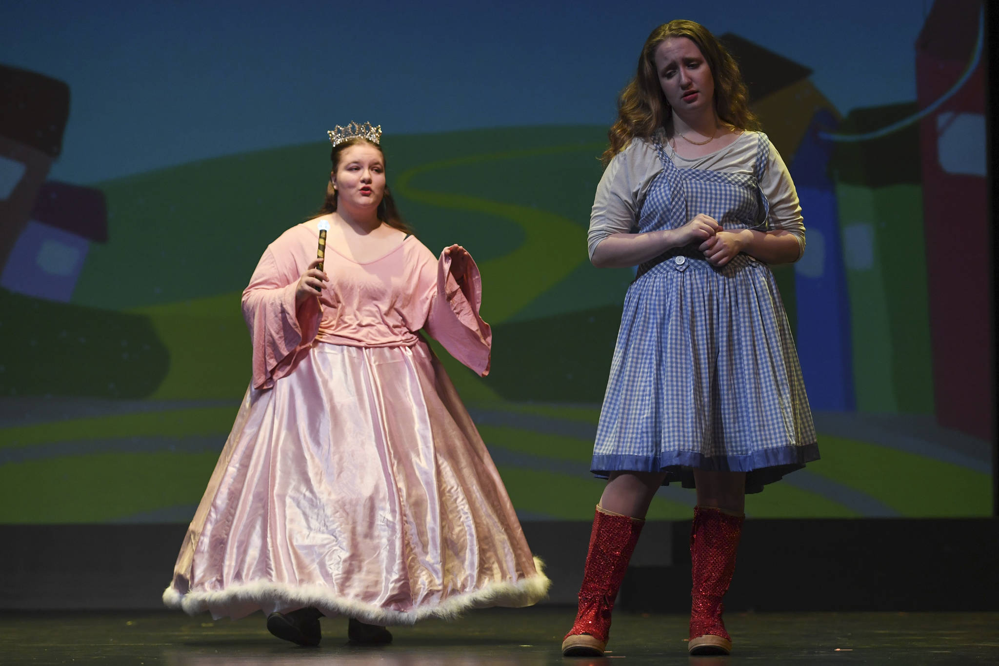 Glinda the Good Witch, played by Nicole Yancey, left, and Dorothy Gale, played by Devin Moorehead, perform during rehearsal for the Thunder Mountain High School production of “Choose Your Own Oz” at TMHS on Friday, Nov. 8, 2019. (Michael Penn | Juneau Empire)