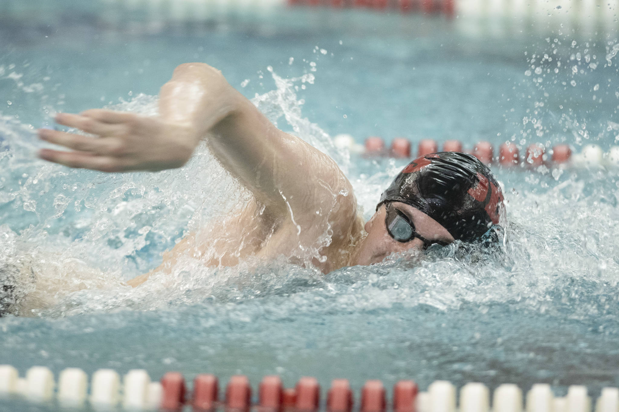 In this file photo from Sept. 20, 2019, Caleb Peimann competes in the 50-yard freestyle at the Juneau Invitational Swim Meet at the Dimond Park Aquatic Center. Peimann won the state 500-yard freestyle in Anchorage on Saturday. (Michael Penn | Juneau Empire File)