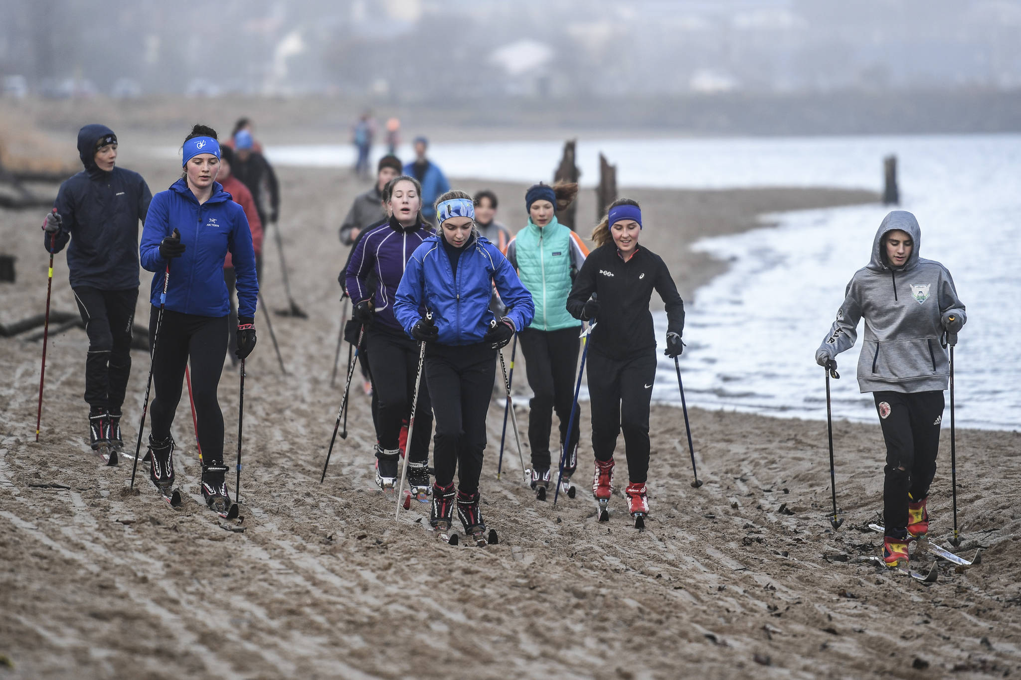 Members of the Juneau Nordic Ski Team practice at Sandy Beach on Friday, Nov. 8, 2019. The team, made up of middle and high school students, is finding alternative ways of training without snow as they prepare for their upcoming season. (Michael Penn | Juneau Empire)