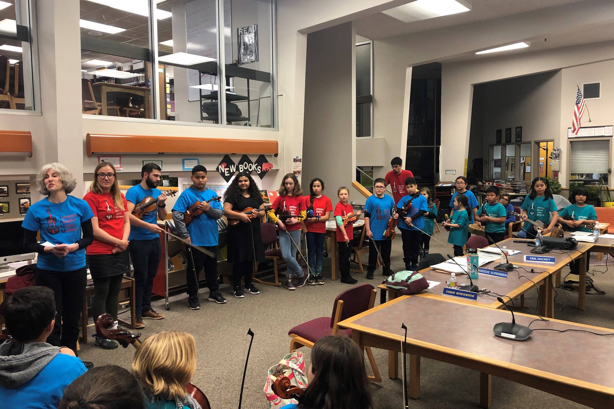 Members of the Juneau Alaska Music Matters program perform for the Juneau School District Board of Education meeting at Juneau Douglas High School: Yadaa.at Kalé on Tuesday, Nov. 12, 2019. (Peter Segall | Juneau Empire)
