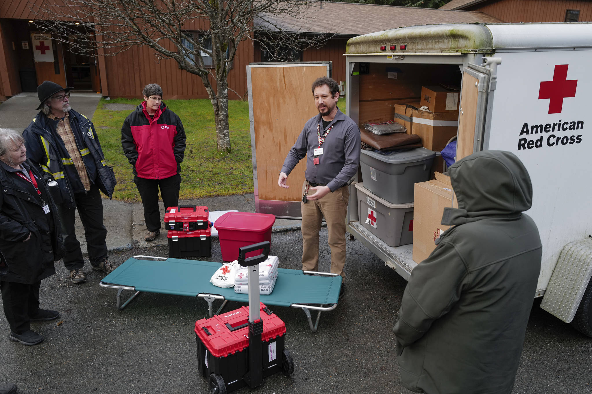 Andrew Bogar, disaster program manager for the American Red Cross in Juneau, shows emergency supplies during a workshop at the Shepherd of the Valley Lutheran Church on Friday, Nov. 15, 2019. The Red Cross is hosting a three-day Southeast Disaster Institute. (Michael Penn | Juneau Empire)