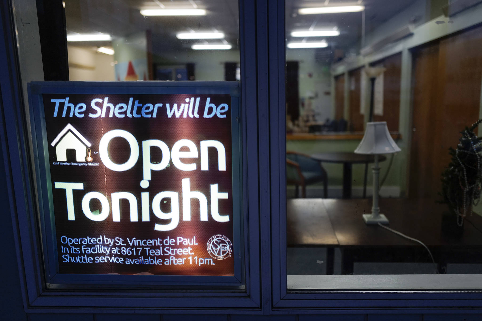 A Cold Weather Emergency Shelter sign at St. Vincent de Paul on Wednesday, Nov. 20, 2019. The shelter is expected to open on Saturday. (Michael Penn | Juneau Empire)