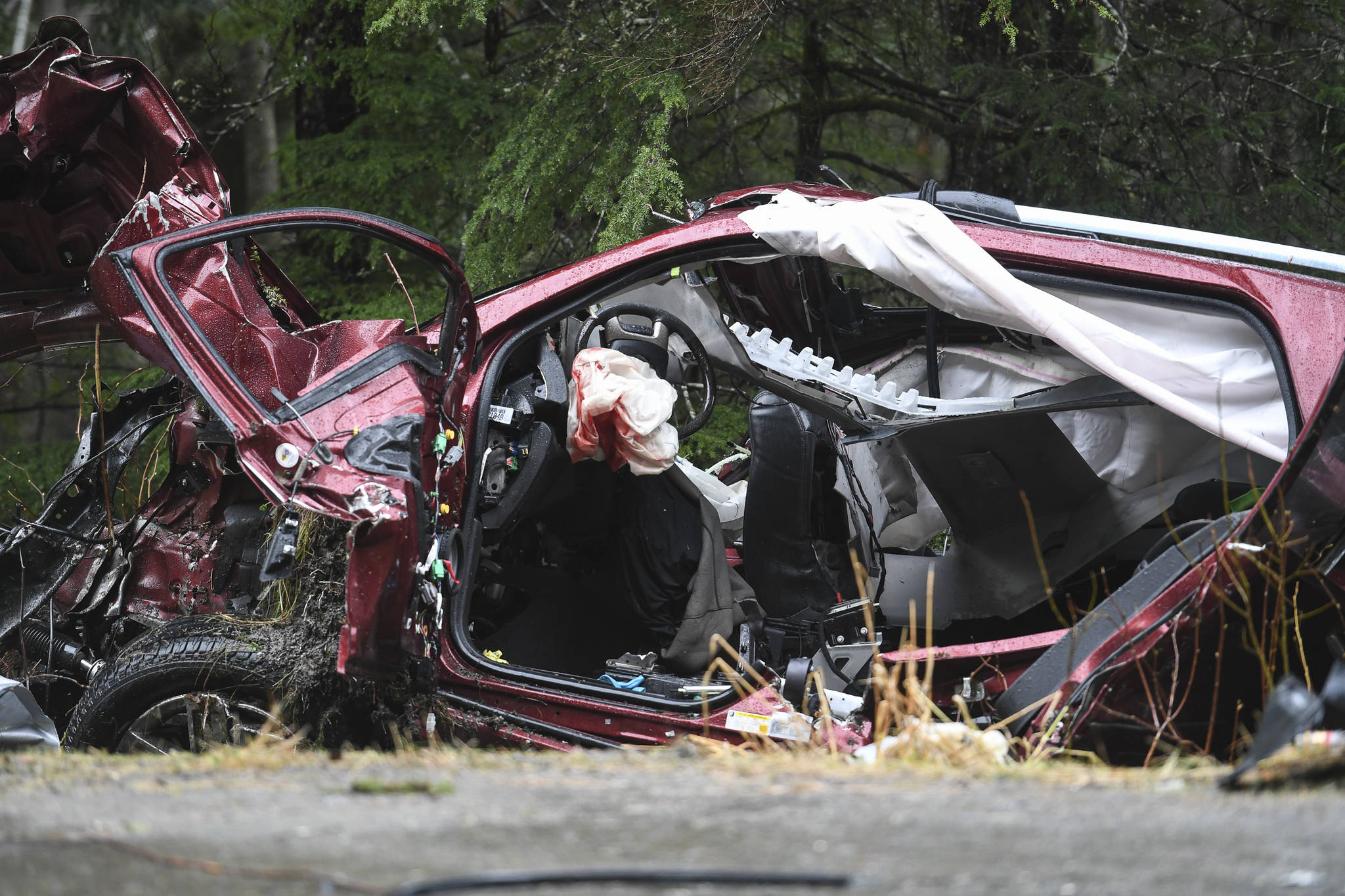 A single-vehicle wreck near Mile 20 Glacier Highway left two dead and two in critical condition on Thursday, Nov. 21, 2019. (Michael Penn | Juneau Empire)