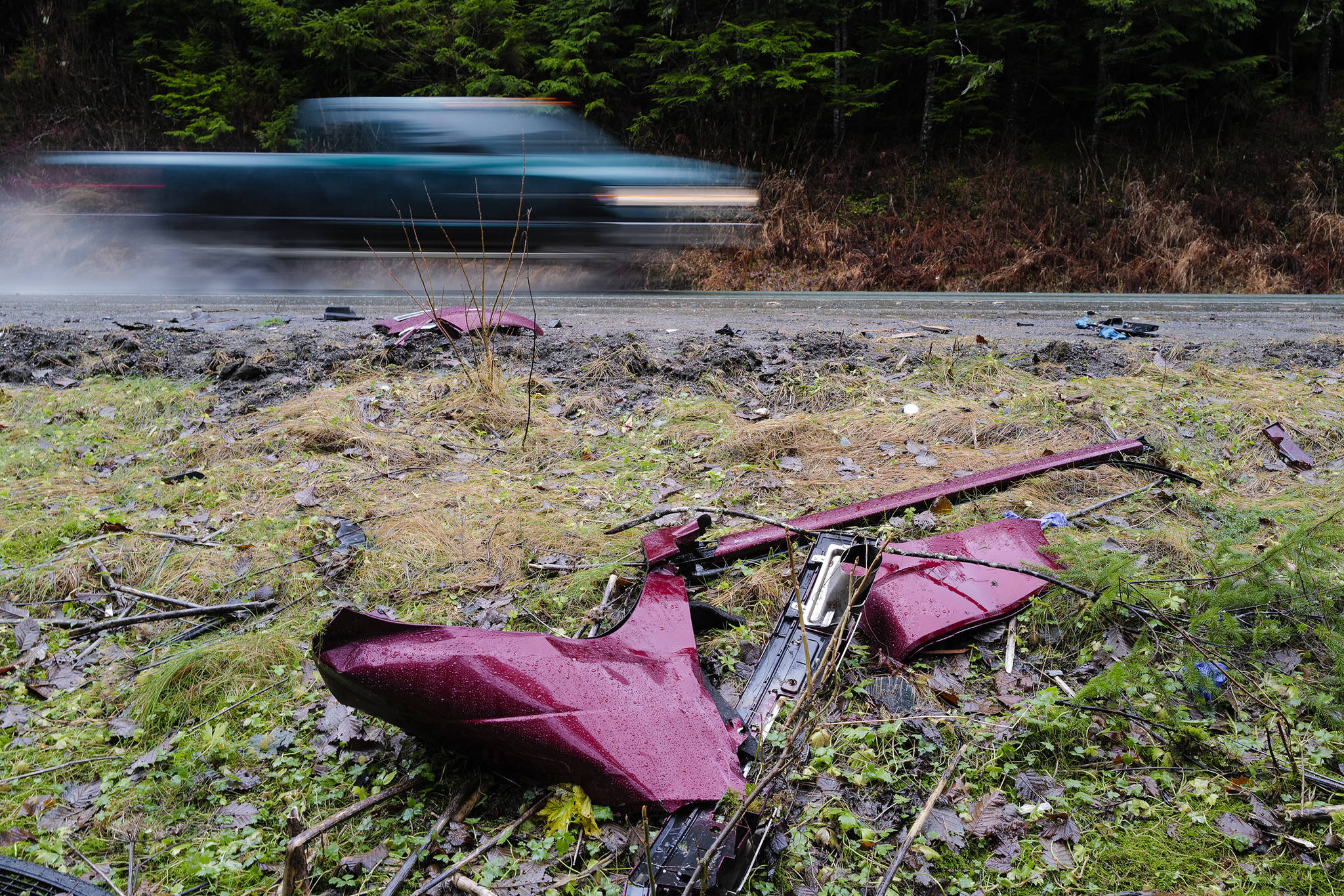 Pieces from a single vehicle accident near Mile 20 remain along Glacier Highway on Friday, Nov. 22. The Thursday morning accident left two dead and two in critical condition. (Michael Penn | Juneau Empire)
