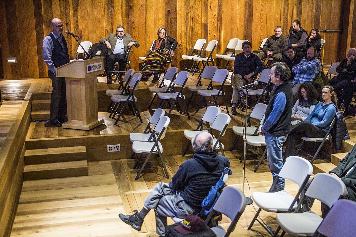 A guest asks Thomas Thornton, dean of Arts and Science at University of Alaska Southeast, a question. Thornton was giving a lecture about the state and nontangible benefits of Alaska’s herring egg trade at the Sealaska Heritage Institute, Nov. 26, 2019. (Michael S. Lockett | Juneau Empire)