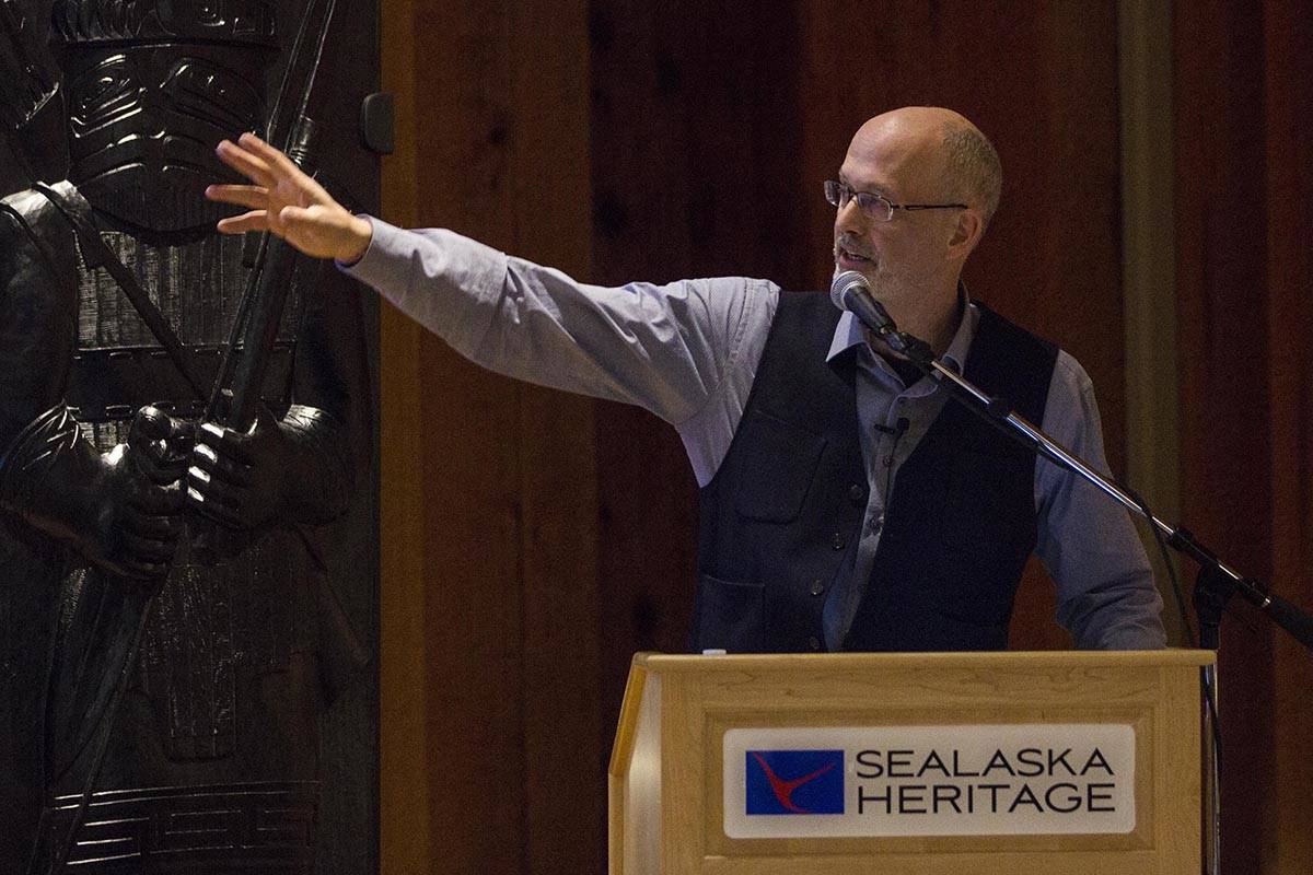 Thomas Thornton, dean of Arts and Science at University of Alaska Southeast, gives a lecture about the state and nontangible benefits of Alaska’s herring egg trade at the Sealaska Heritage Institute, Nov. 26, 2019. (Michael S. Lockett | Juneau Empire)