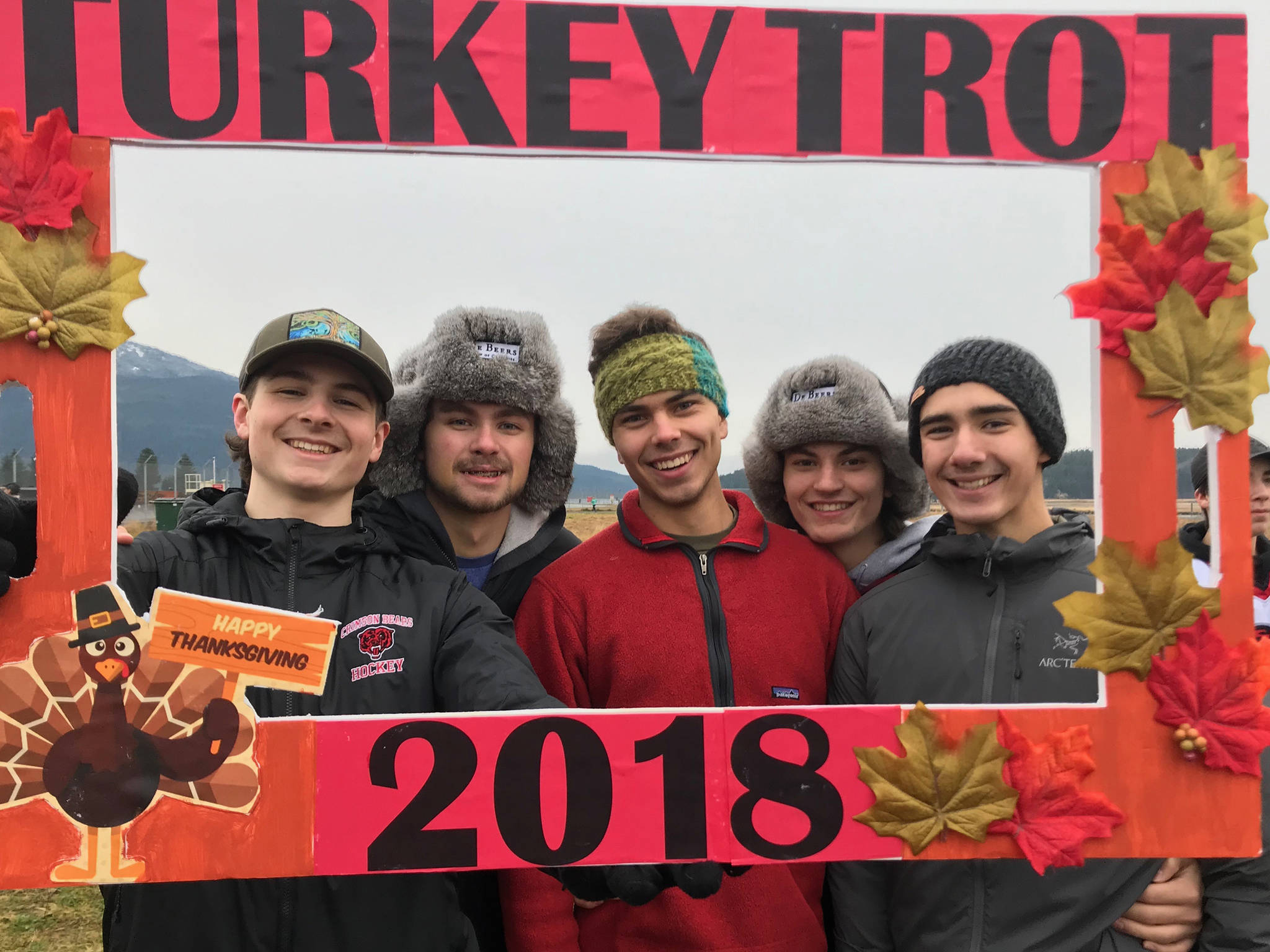 Juneau-Douglas High School hockey seniors (left to right) Cameron Smith, Bill Bosse, Ronan Lynch, Greyson Liebelt and Blake Bixby pose for a picture during the annual Thanksgiving Day Turkey Trot at the Airport Dike Trail. The JDHS hockey team and Thunder Mountain High School cross country teams helped put on the event. (Courtesy Photo | Tyra Smith-MacKinnon)