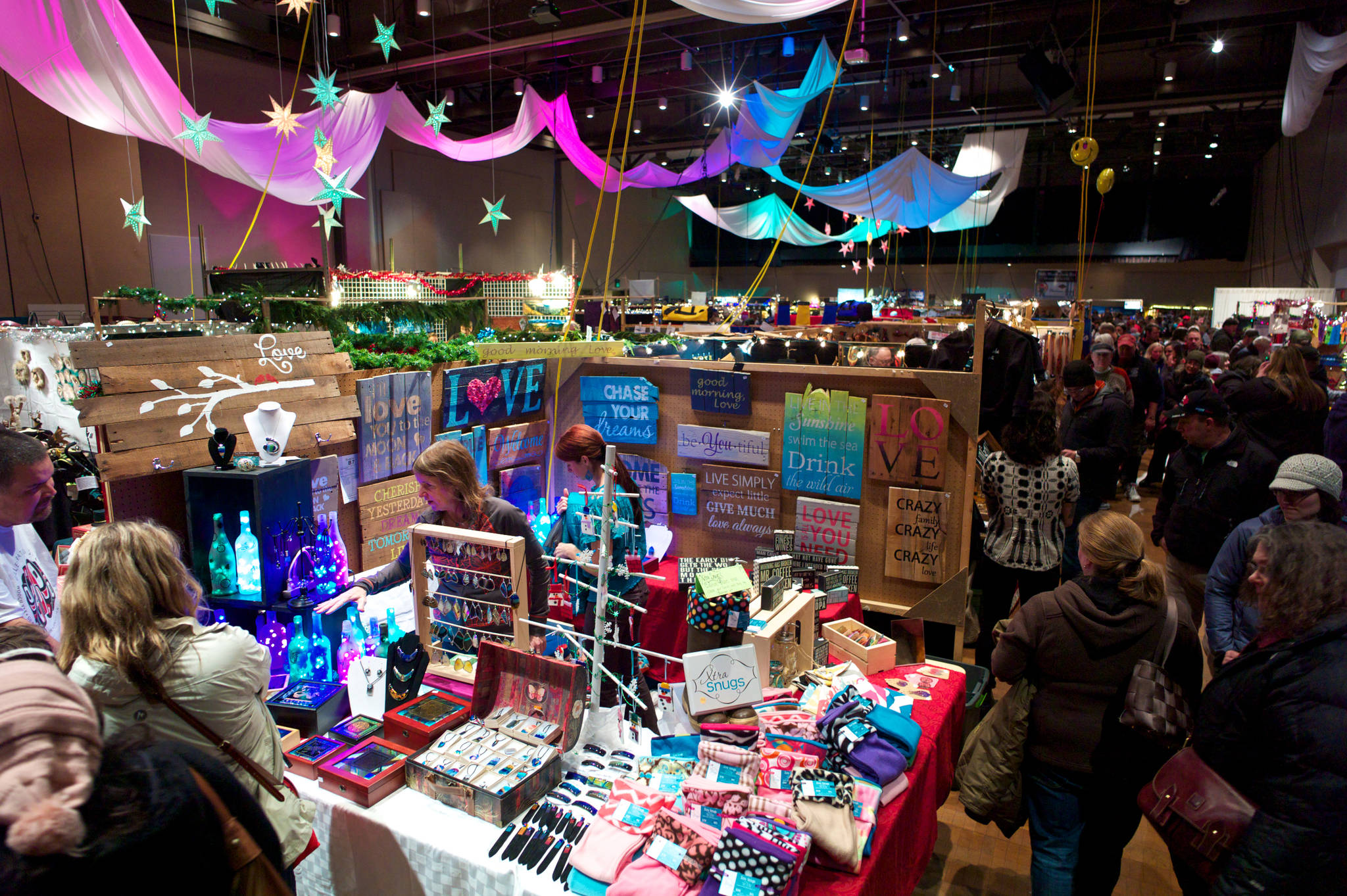 Vendors and customers flood the floor at Centennial Hall during the Public Market in November 2014. This year, 206 vendors will be at Juneau Arts & Culture Center, Centennial Hall and Elizabeth Peratrovich Hall. (Michael Penn | Juneau Empire File)