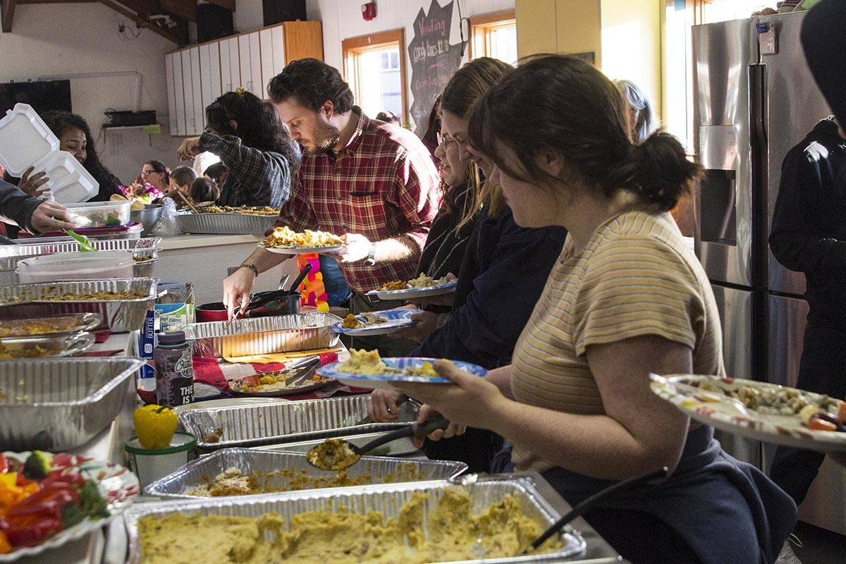 Volunteers came together to cook and serve a Thanksgiving meal for Yaakoosge Daakahidi High School students at the Zach Gordon Youth Center on Nov. 27, 2019 following a crash that killed two YDHS students last week. (Michael S. Lockett)