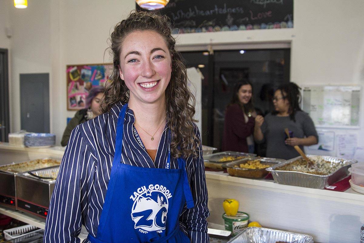 Kaitlyn Conway, a student support specialist at Yaakoosge Daakahidi High School, helped organize a Thanksgiving meal for students and parents at the Zach Gordon Youth Center on Nov. 27, 2019 following a crash that killed two YDHS students last week. (Michael S. Lockett)