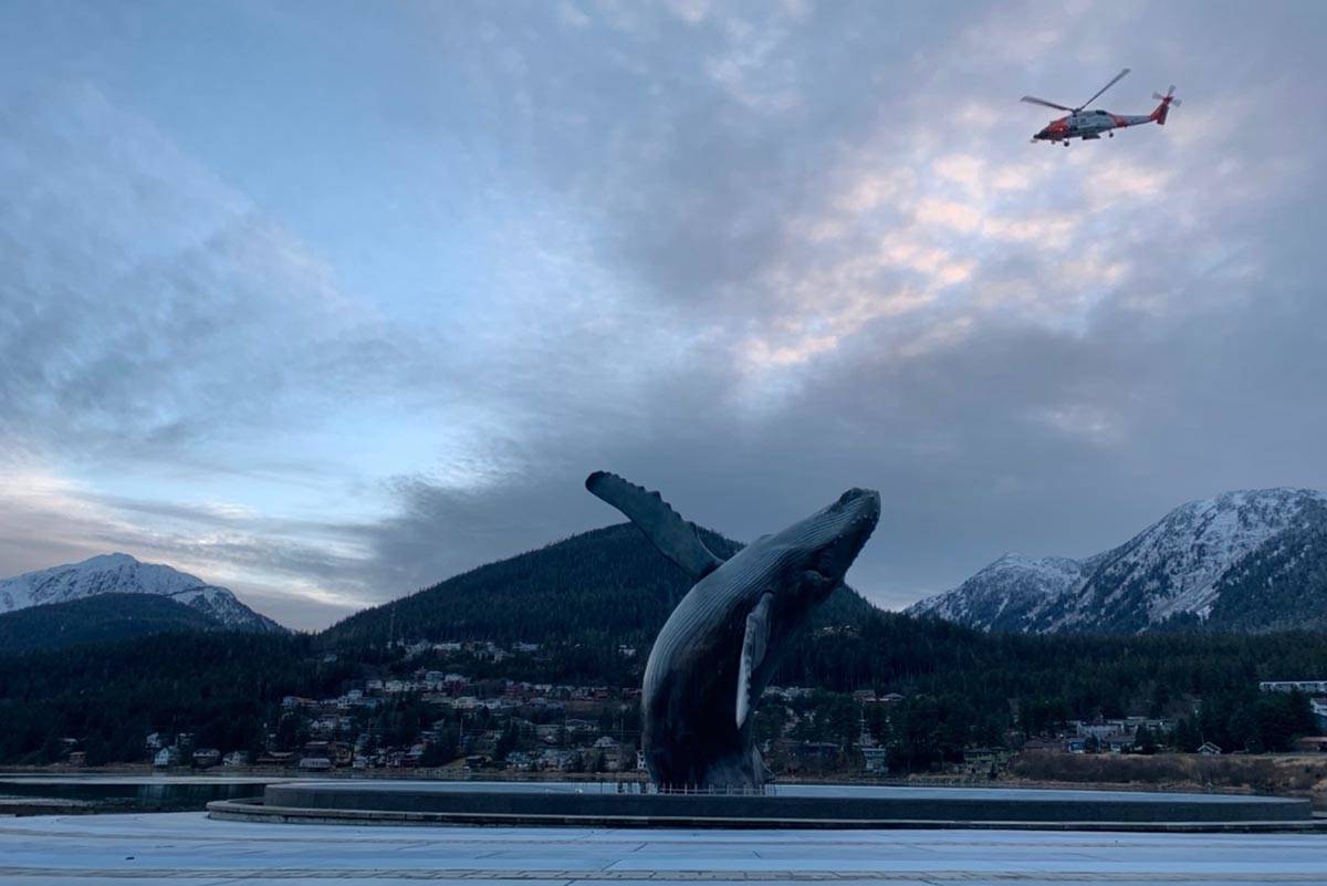 A U.S. Coast Guard MH-60T Jayhawk searches Gastineau Channel for a possible missing boater after the boat Sealion was found adrift near the Petro Marine docks on Nov. 29, 2019. (Yang-Hui Lee | Courtesy Photo)