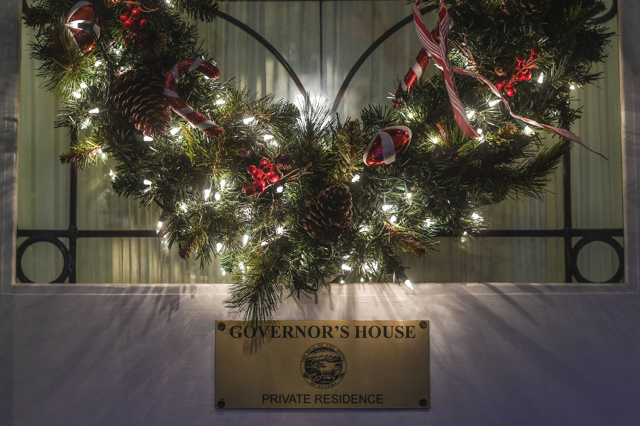 A holiday wreath decorates the front door at the Governor’s House on Wednesday, Dec. 4, 2019. The annual Governor’s Open House is Tuesday, Dec. 10. (Michael Penn | Juneau Empire)
