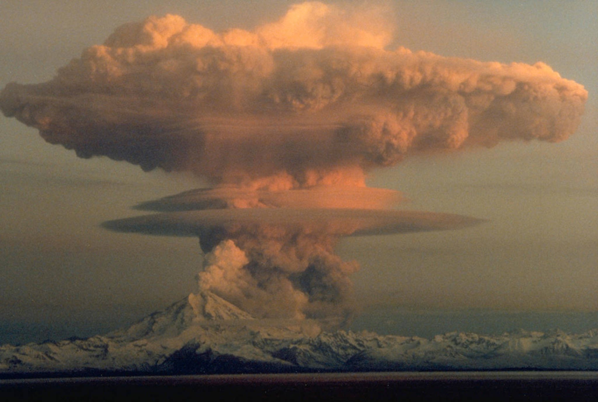 Mount Redoubt west of Kenai erupts an ash cloud on April 21, 1990, during the same unrest that launched the fledgling Alaska Volcano Observatory. (Courtesy Photo | Robert Clucas)