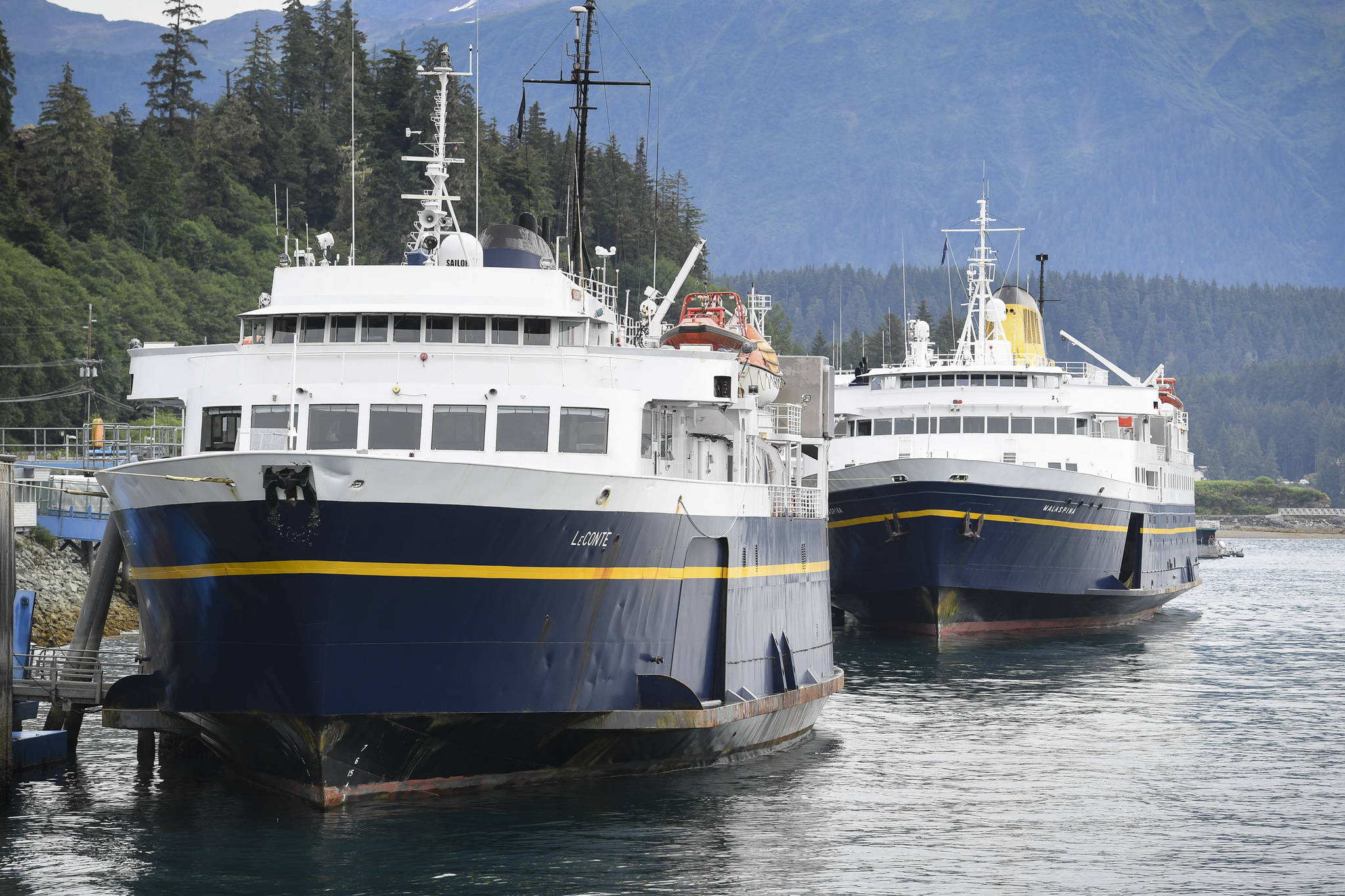 In this July 2019 photo, the Alaska Marine Highway System ferries LeConte, left, Malaspina and Tazlina, hidden from view, are tied up at the Auke Bay Terminal. (Michael Penn | Juneau Empire File)